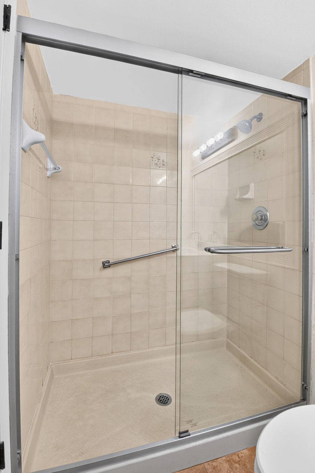 Primary Bathroom new shower doors.