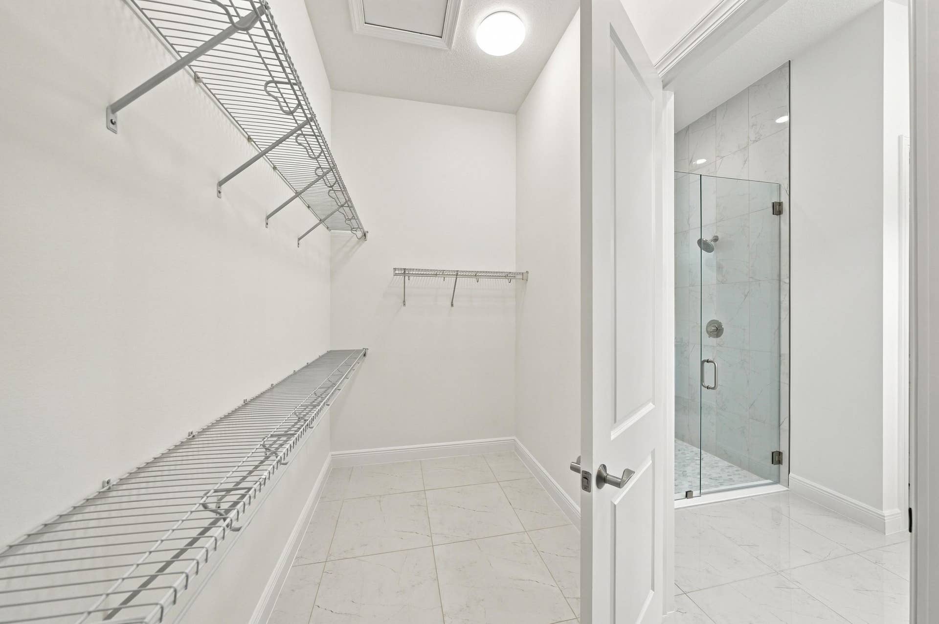 4931 Rivo Alto Circle, Westlake, FL 33470 Primary bedroom walk-in closet