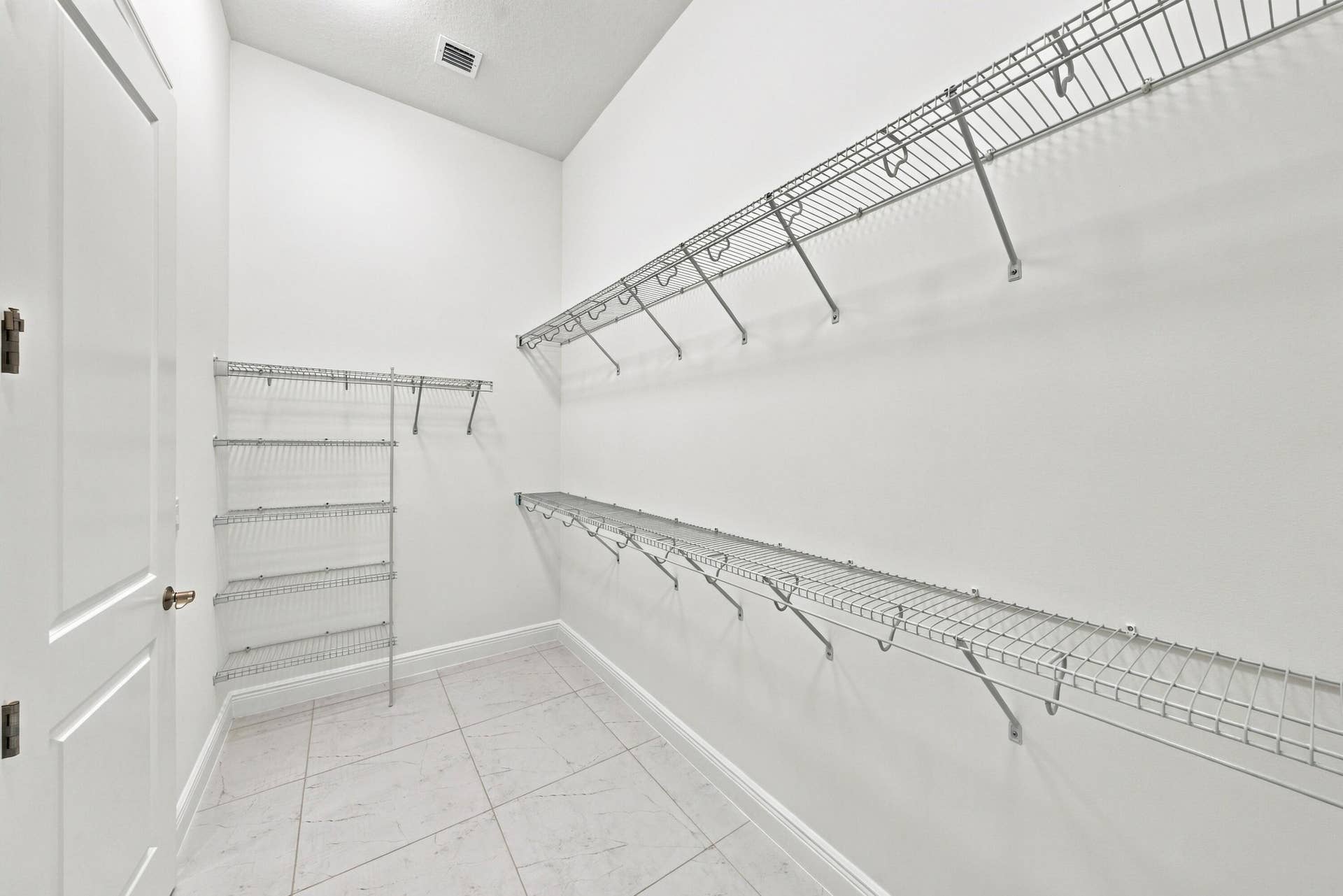 4931 Rivo Alto Circle, Westlake, FL 33470 Primary bedroom walk-in closet
