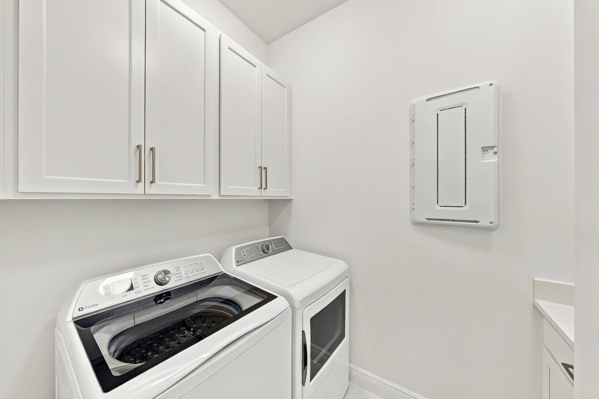 4931 Rivo Alto Circle, Westlake, FL 33470 Laundry room upgraded washer and dryer with upgraded cabinets