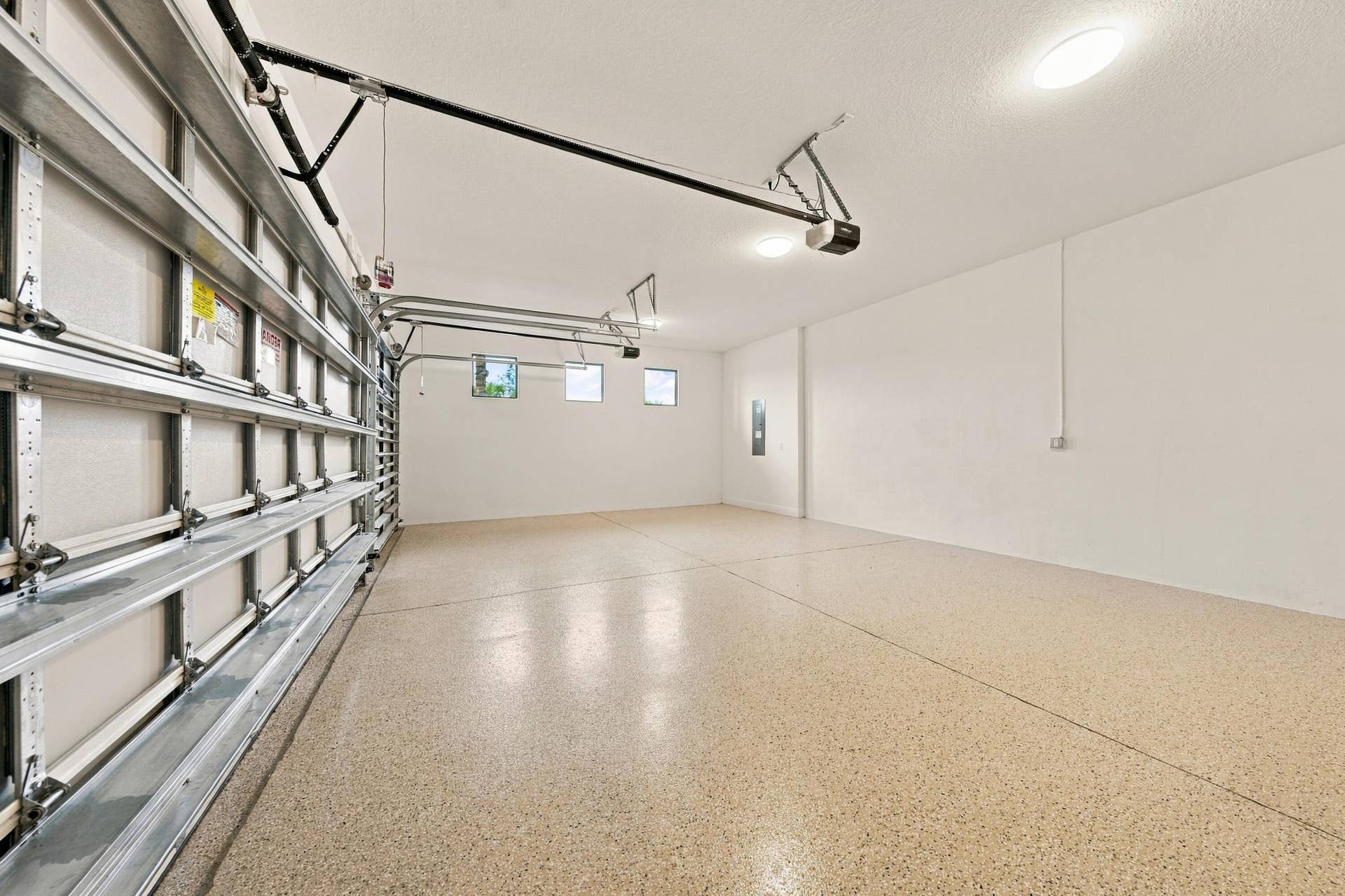 4931 Rivo Alto Circle, Westlake, FL 33470 3 car garage with epoxy floors 3 windows and garage entry keypad