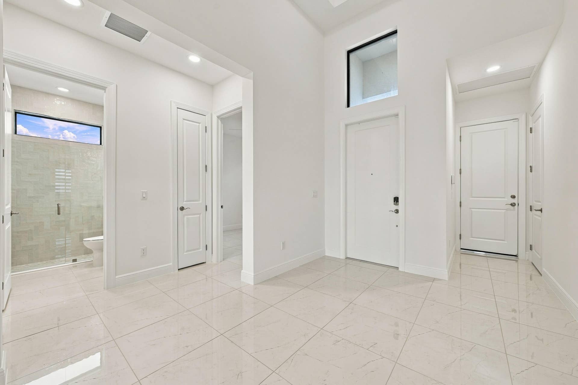 4931 Rivo Alto Circle, Westlake, FL 33470 Entry, garage entry, 3rd bedroom and 3rd bathroom