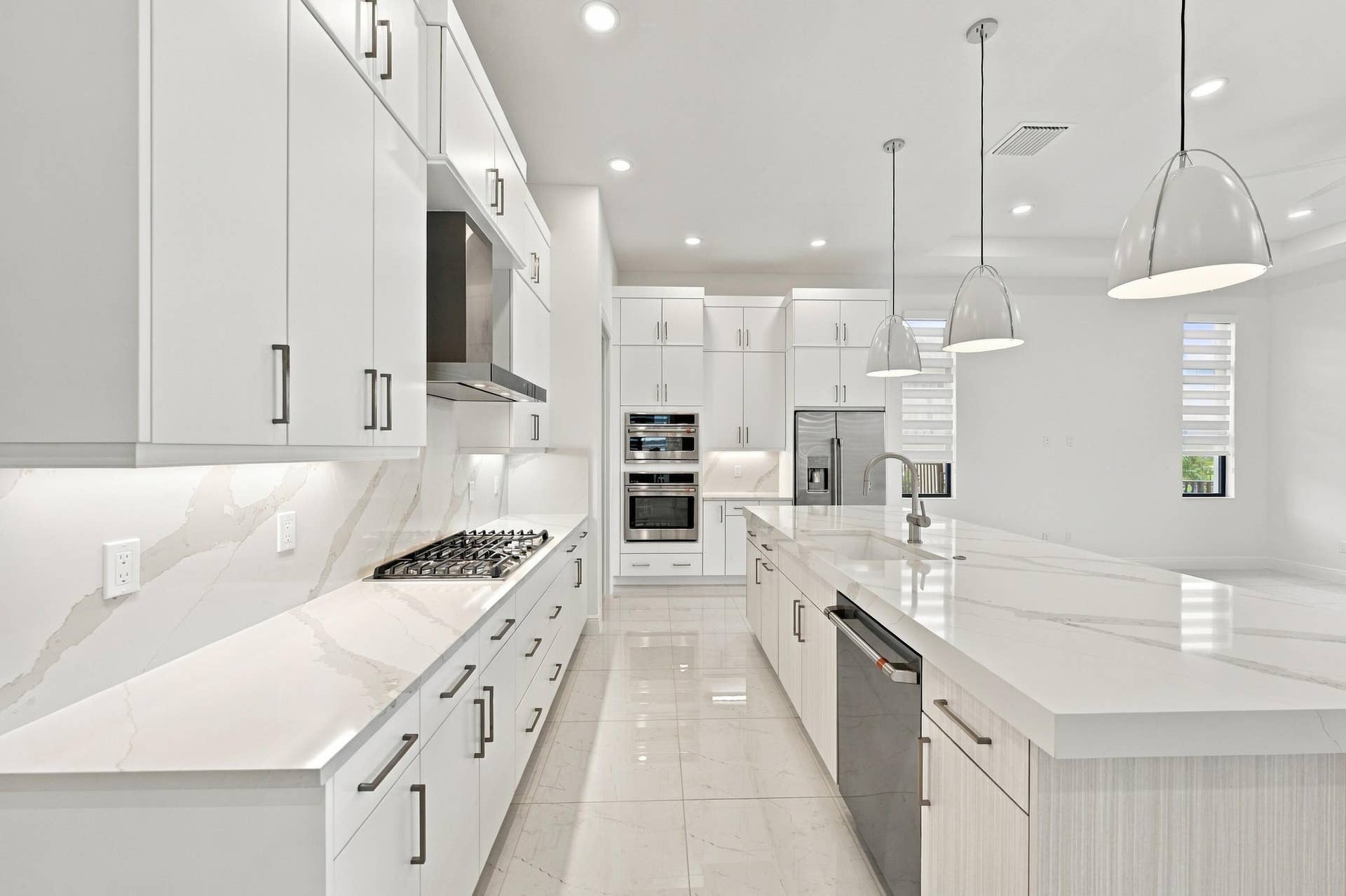 4931 Rivo Alto Circle, Westlake, FL 33470 Satin nickel finishes with upgraded quartz countertops and backsplash