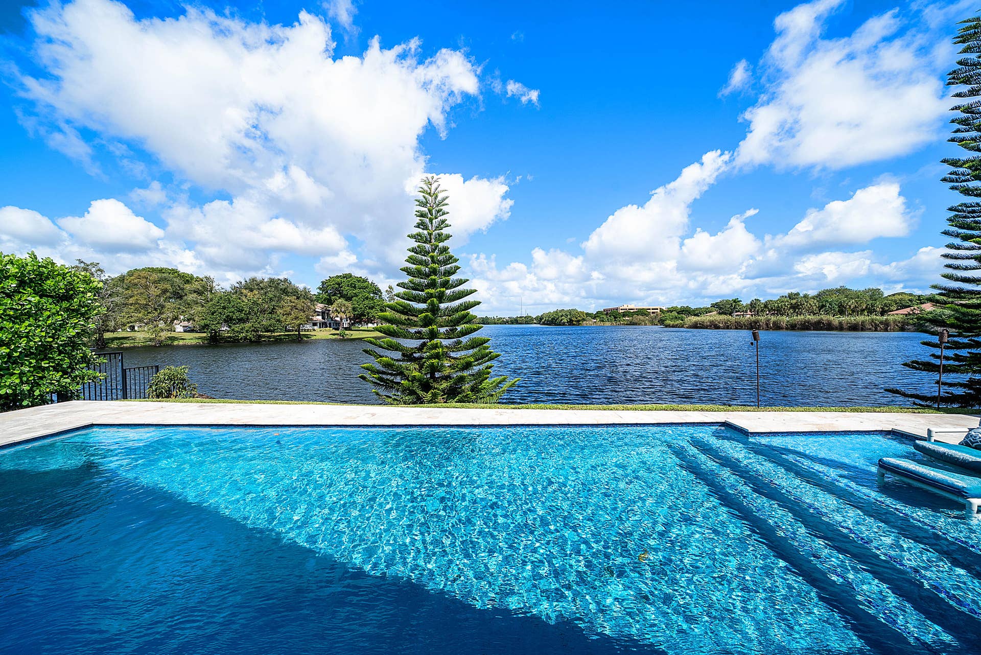 9 Aspen Court, Boynton Beach, FL 33436 Heated Pool Lake front view