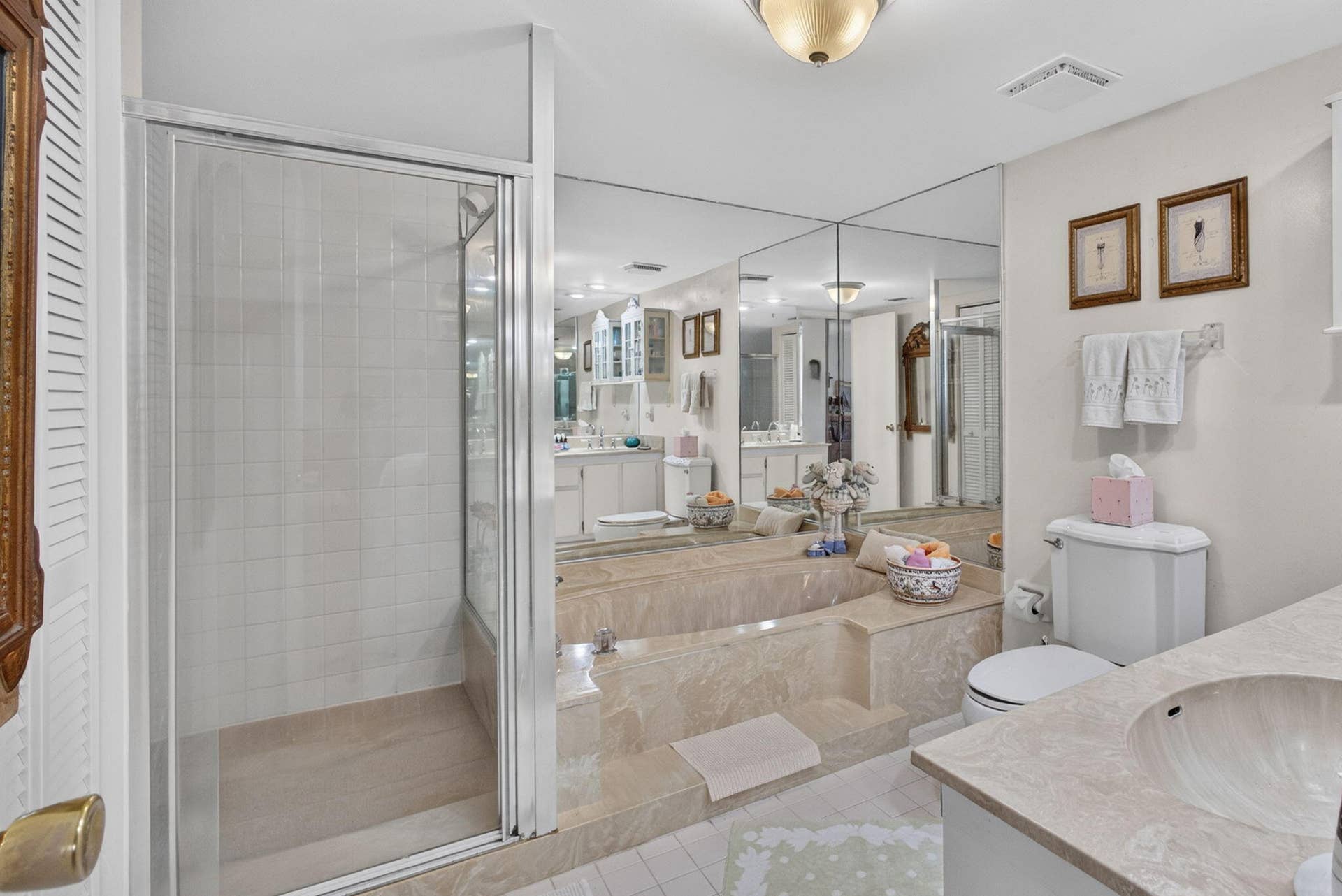 Full size bathtub and walk in Shower