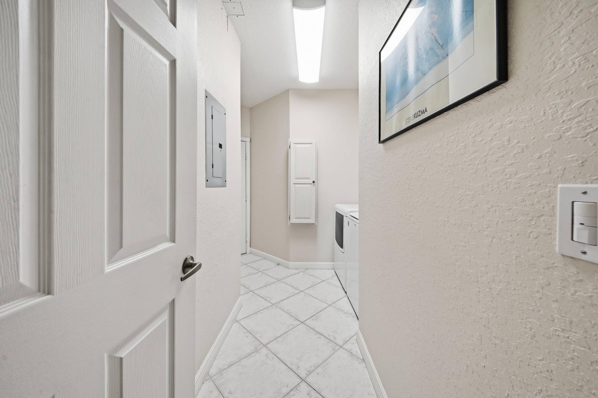 7986 EXETER Boulevard W, #101, Tamarac, FL 33321 Hallway to laundry room