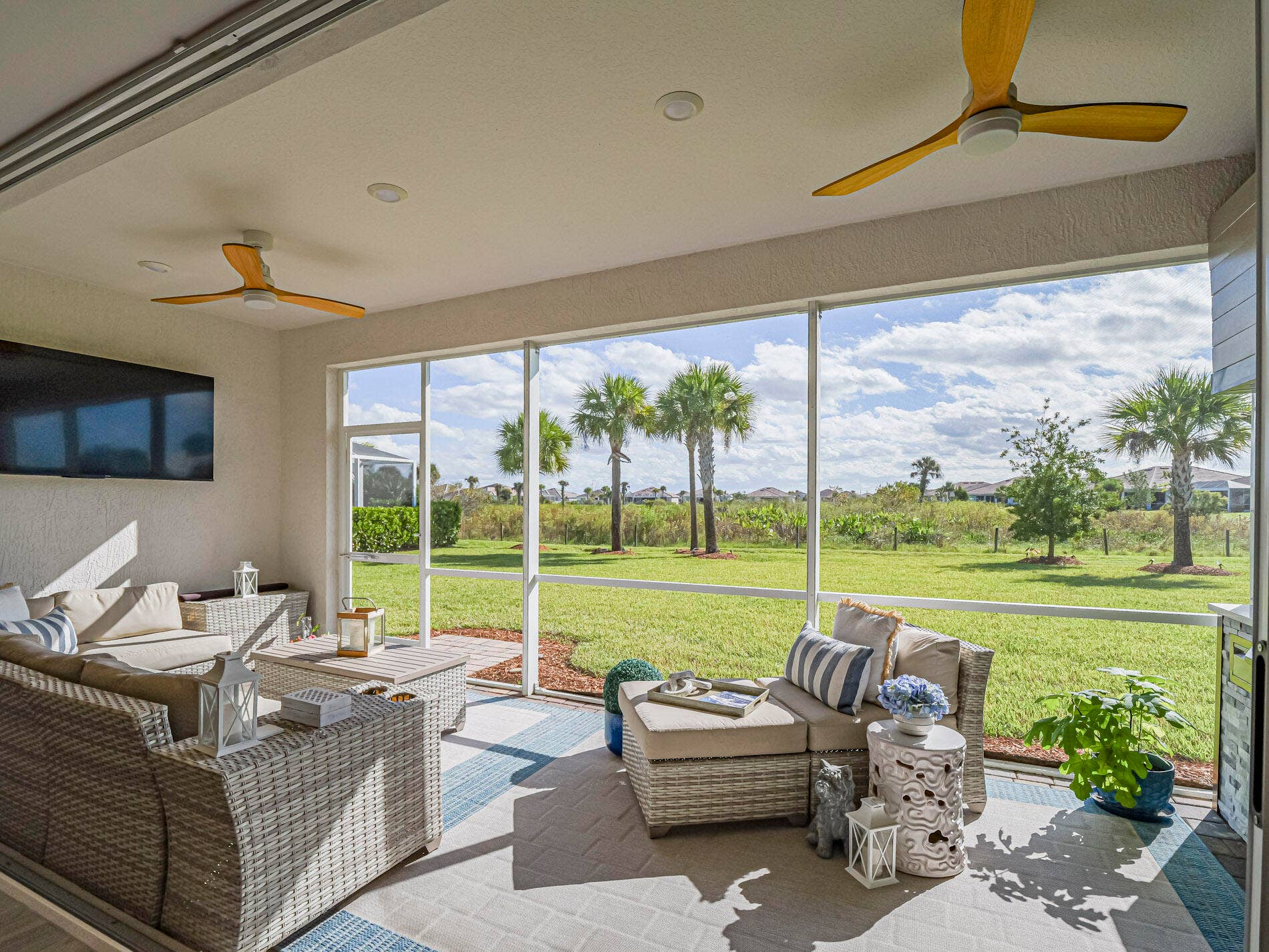 13580 SW GINGERLINE Drive, Port St Lucie, FL 34987 Screened lanai with custom ceiling fans