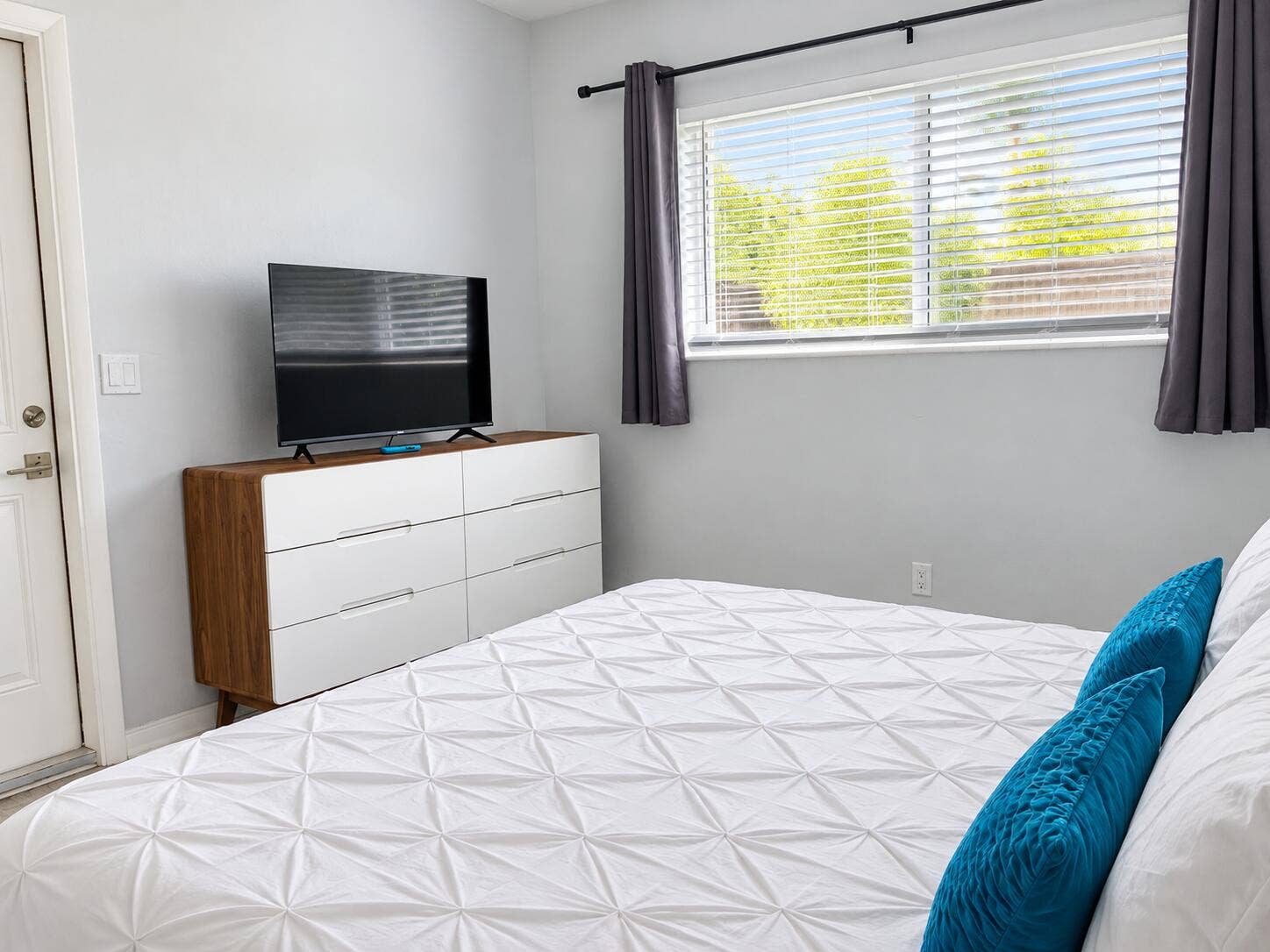 1261 SE 2ND Street, #1, Deerfield Beach, FL 33441 Sunlit Modern Bedroom with Teal Accents