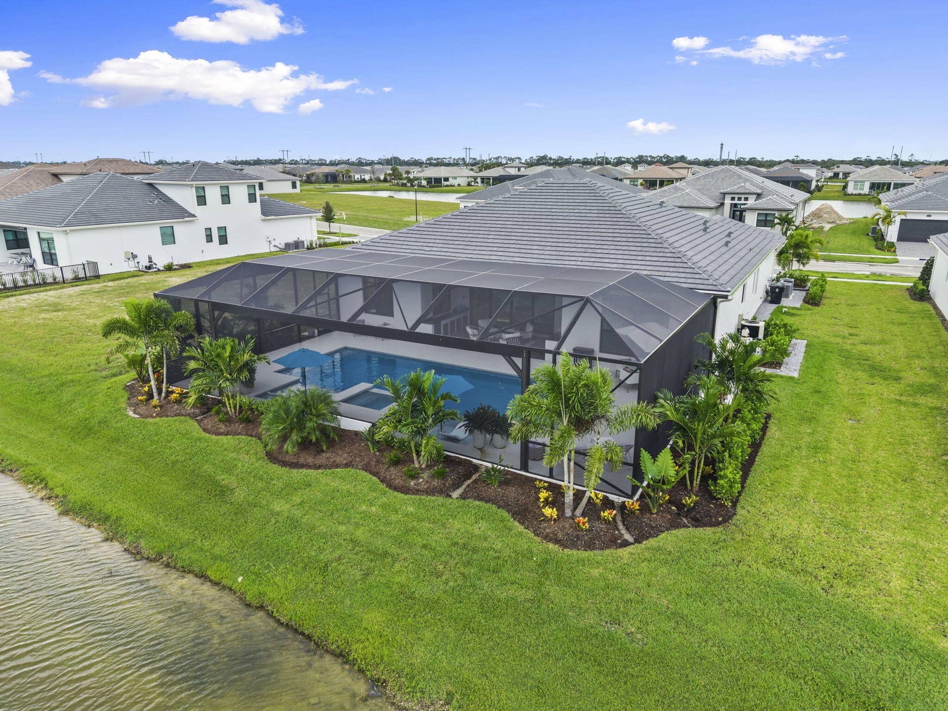 8365 SW Puccini Way, Port St Lucie, FL 34987 80-web-or-mls-DJI_20261008143027_0460_D