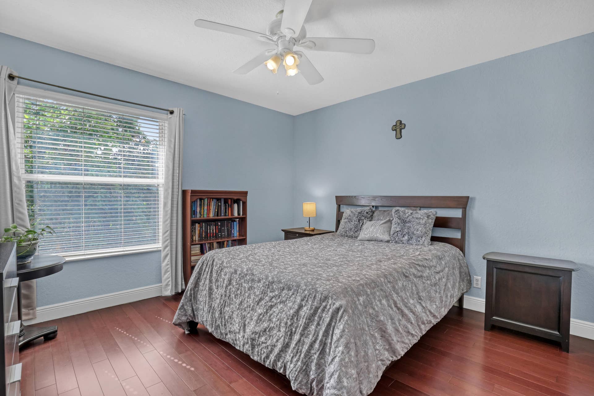 762 GAZETTA Way, West Palm Beach, FL 33413 Bedroom featuring wood-finish flooring, a ceiling-mounted light fixture with fan, and a large window with horizontal blinds