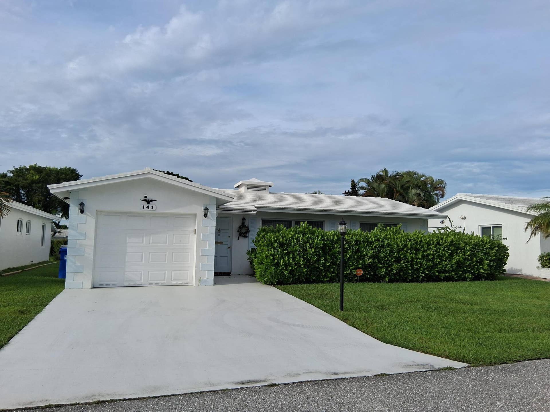 141 NW 24th Court, Pompano Beach, FL 33064 Garage & Driveway