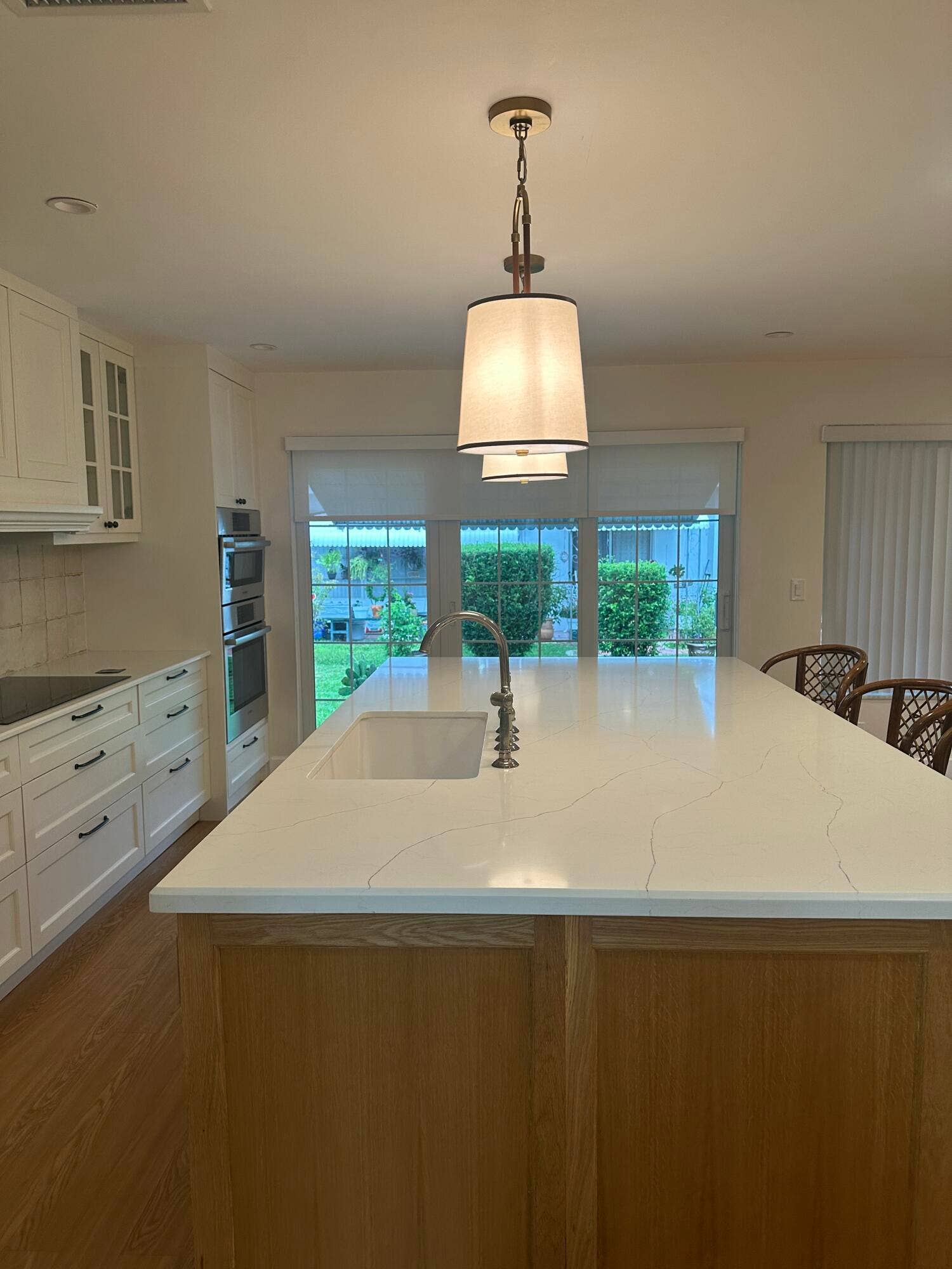 141 NW 24th Court, Pompano Beach, FL 33064 Kitchen Island with Dishwasher & Wine Cooler & Sliding Doors Out To Patio