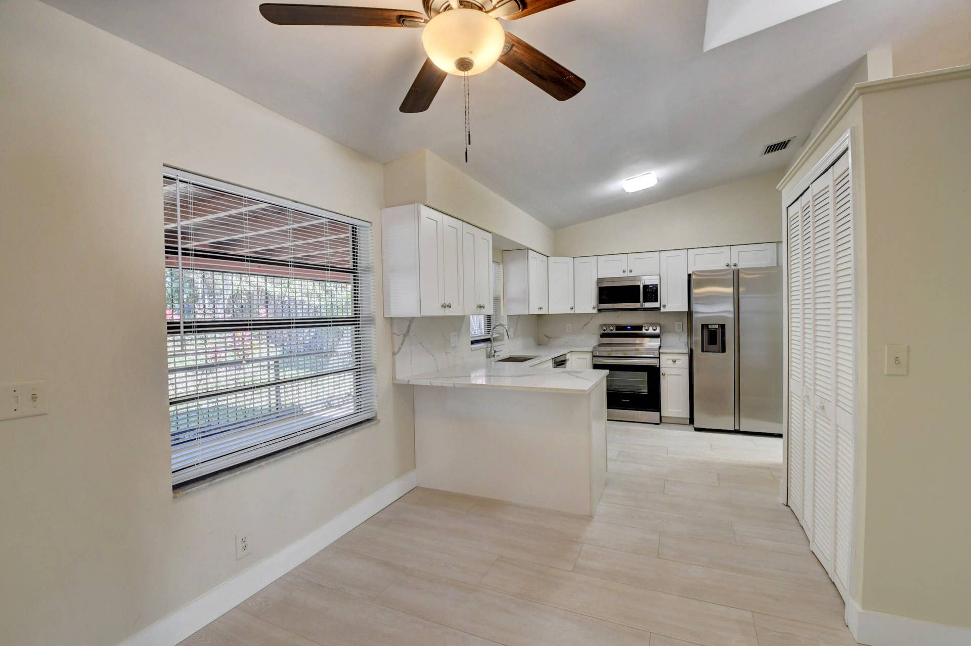 Bright Kitchen with Breakfast Bar