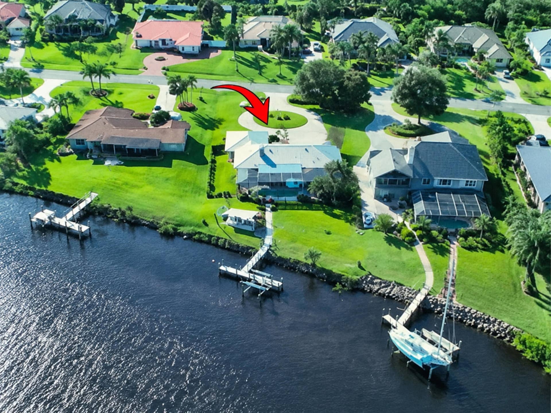 Screened-in pool w Spa, Enjoy the view of the river from the dock or on your private water-front patio with sunshade.