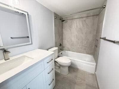 345 WELLINGTON H, #345, West Palm Beach, FL 33417 Full bath with tub/shower, updated fixtures and new tile.