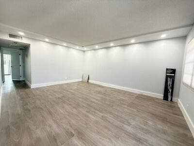 345 WELLINGTON H, #345, West Palm Beach, FL 33417 High hat lighting surround in living room.