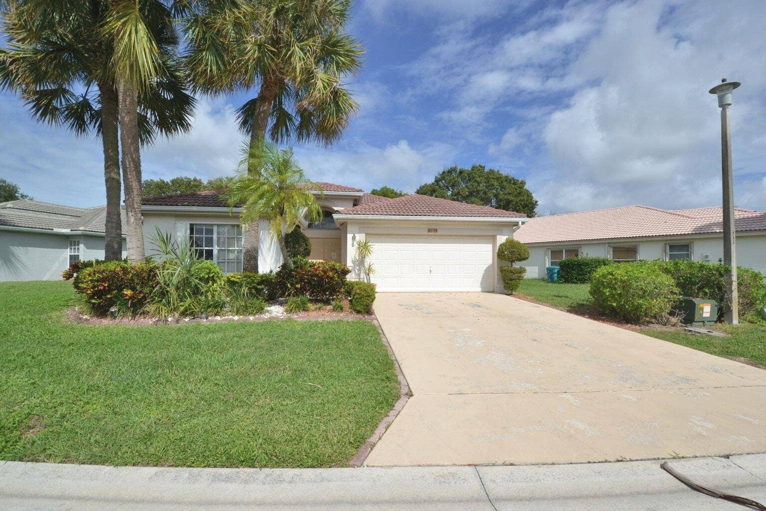 8179 WHITE ROCK Circle, Boynton Beach, FL 33436 01_front_exterior_1