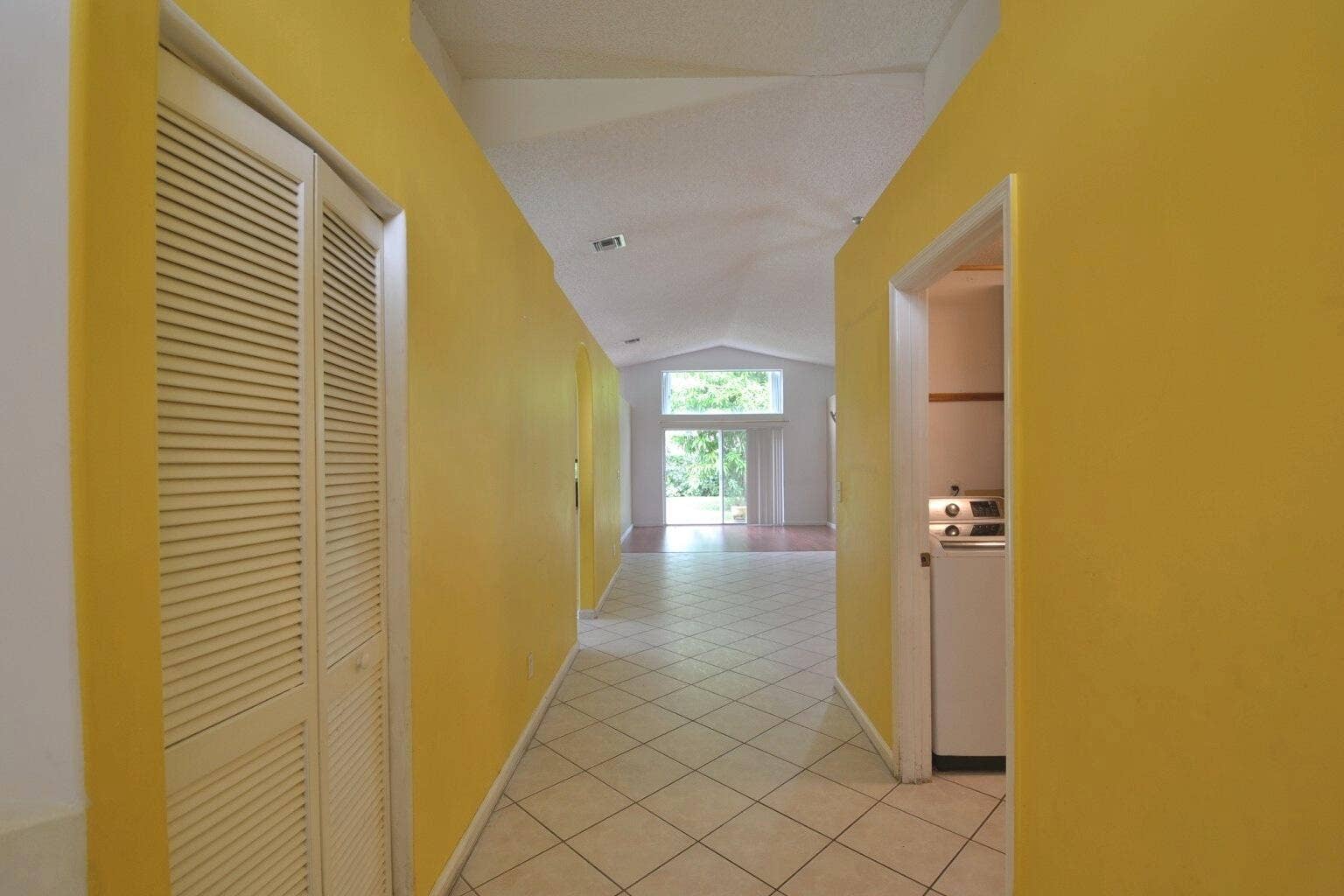 8179 WHITE ROCK Circle, Boynton Beach, FL 33436 10_hallway_laundry
