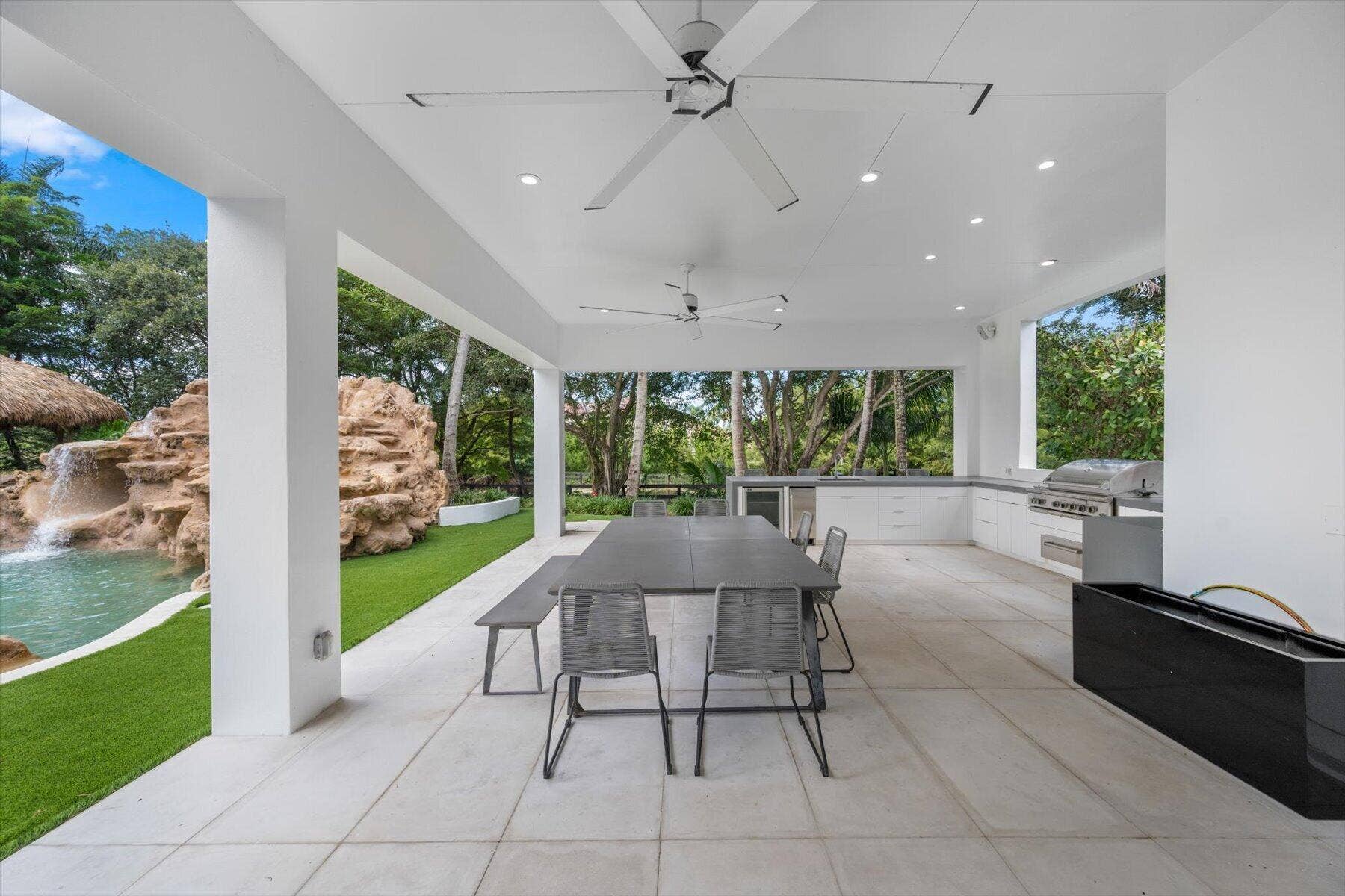 3580 Aiken Court, Wellington, FL 33414 Covered Patio with outdoor kitchen
