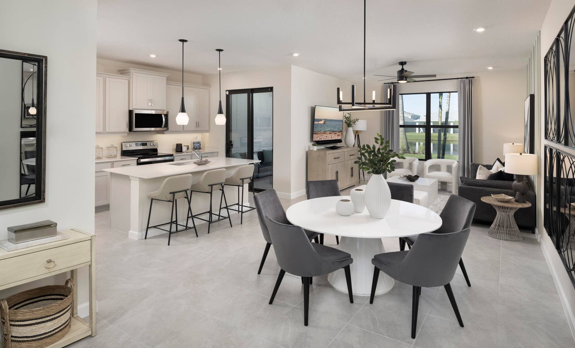 9903 SW TORQUAY Drive, Port St Lucie, FL 34987 Stock photos represent builder's floorplan