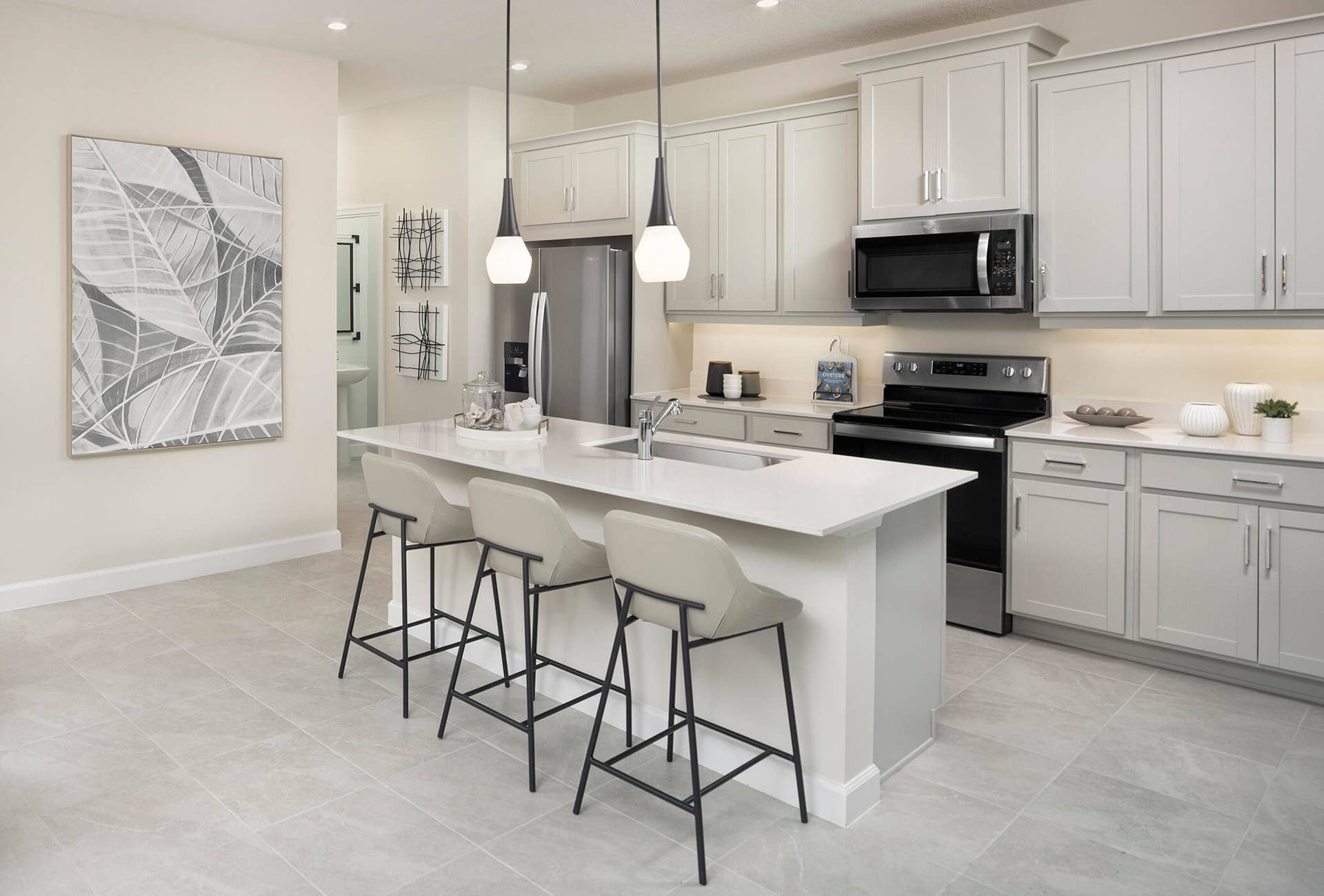 9903 SW TORQUAY Drive, Port St Lucie, FL 34987 Stock photos represent builder's floorplan