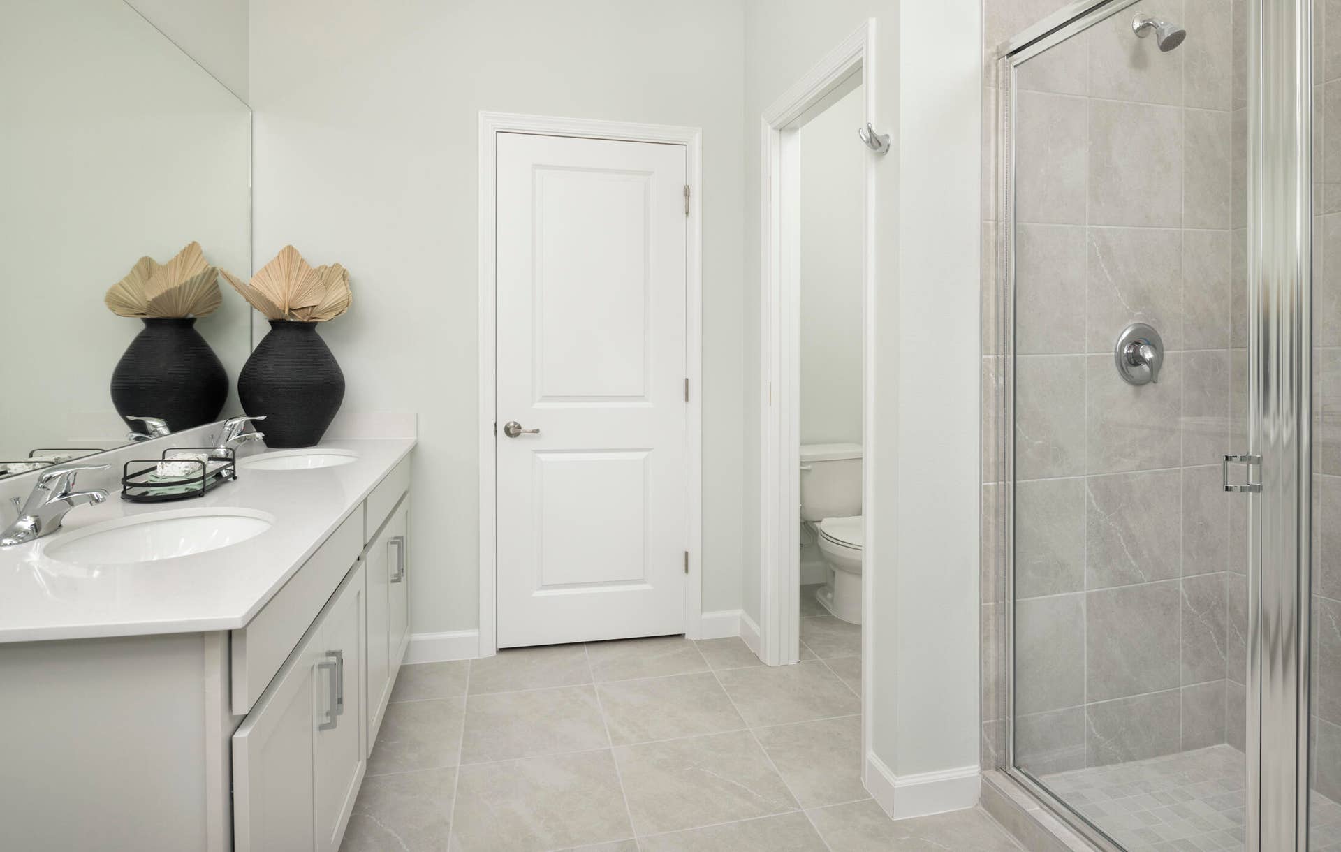 9903 SW TORQUAY Drive, Port St Lucie, FL 34987 Stock photos represent builder's floorplan
