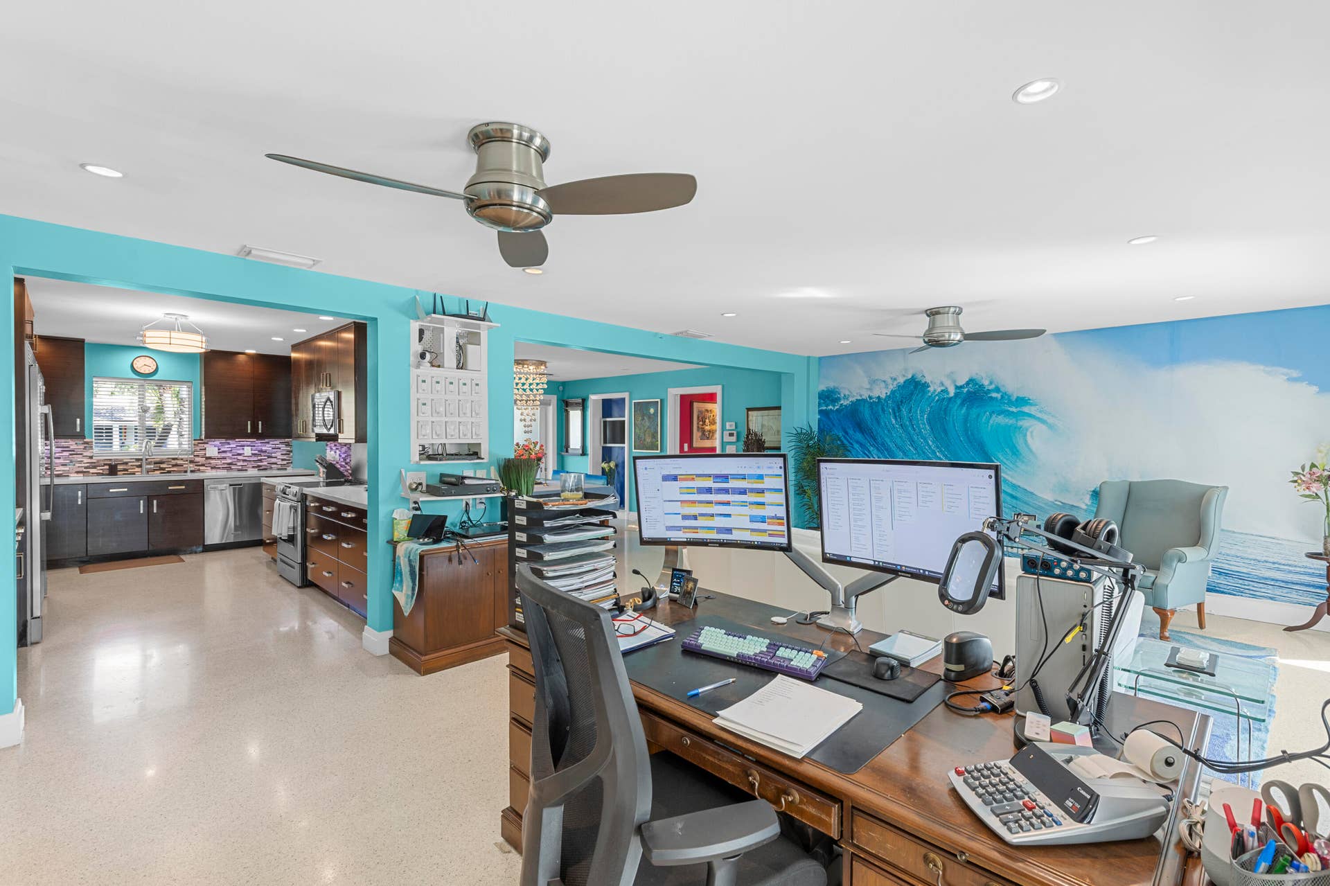 2317 NW 6th Avenue, Wilton Manors, FL 33311 Open-concept interior featuring polished concrete flooring, recessed lighting, and dual ceiling fans