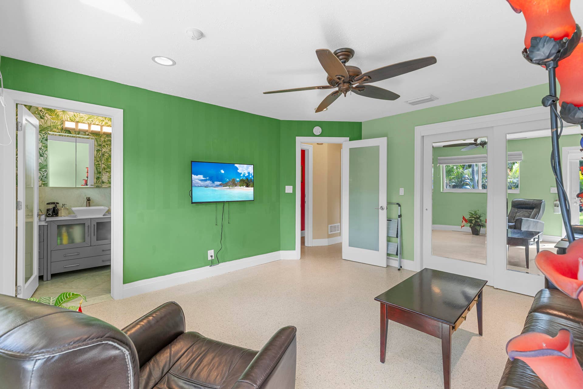 2317 NW 6th Avenue, Wilton Manors, FL 33311 Interior room featuring recessed lighting, a ceiling fan, light-colored flooring, and interior doors with frosted glass inserts