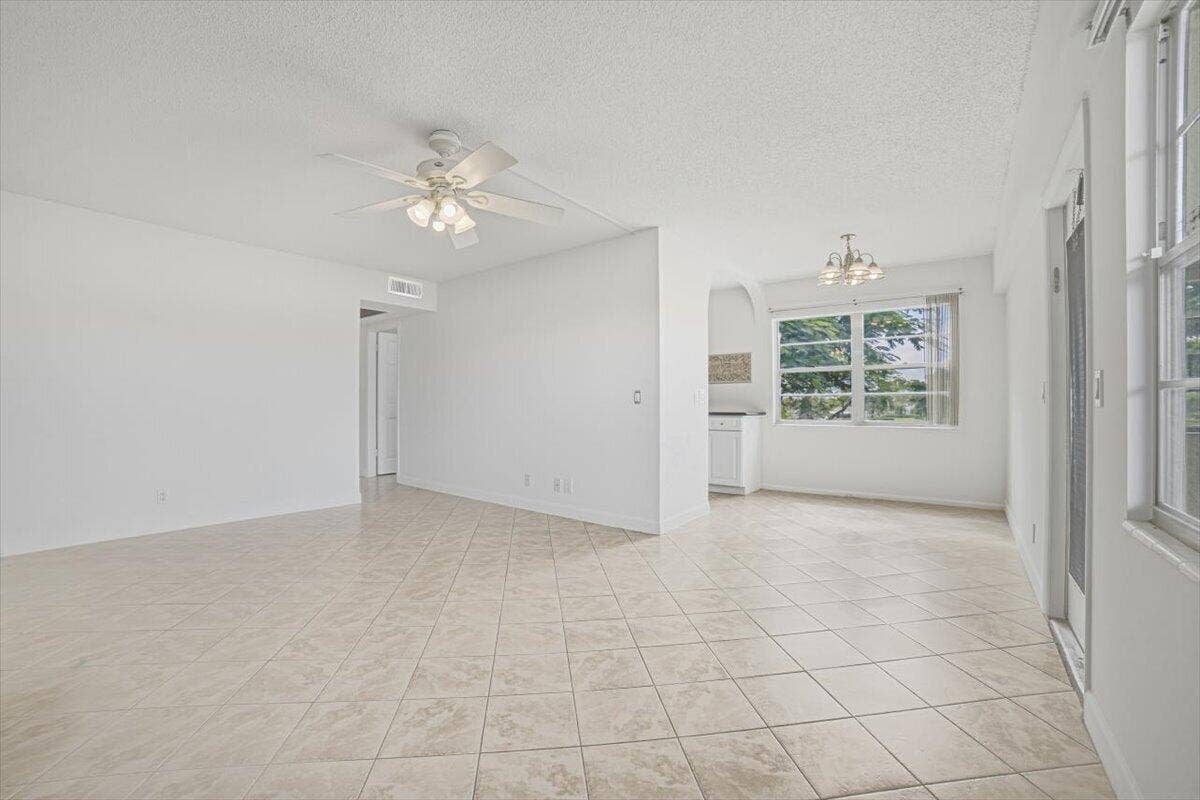 LR facing dining area and kitchen