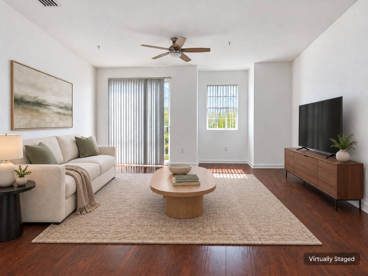 2725 NE 8TH Avenue, #112, Wilton Manors, FL 33334 Virtually staged sage-accented living ro