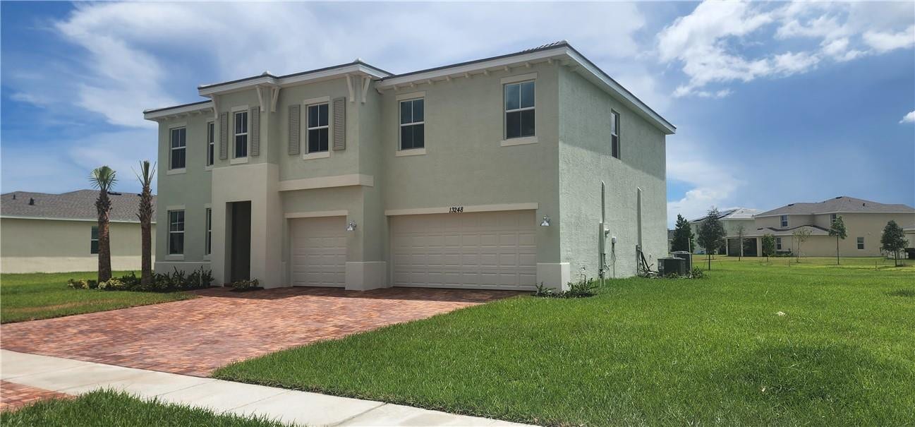 13248 NW Copper Creek Drive, Port St Lucie, FL 34987 Front of House