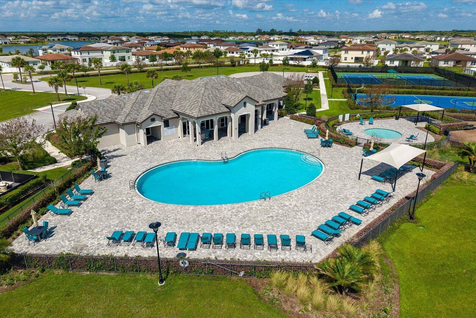 13248 NW Copper Creek Drive, Port St Lucie, FL 34987 Aerial view community pool and club nice