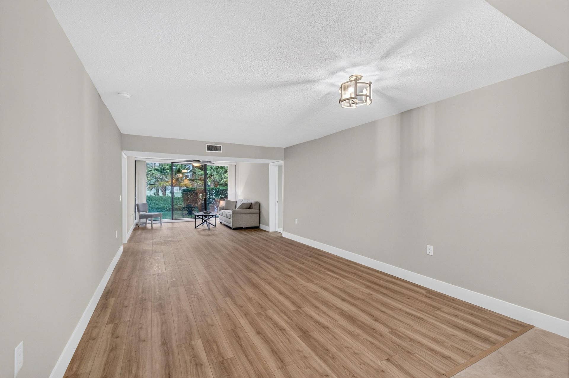 6169 Balboa Circle, #103, Boca Raton, FL 33433 Living Room and Dining Romm