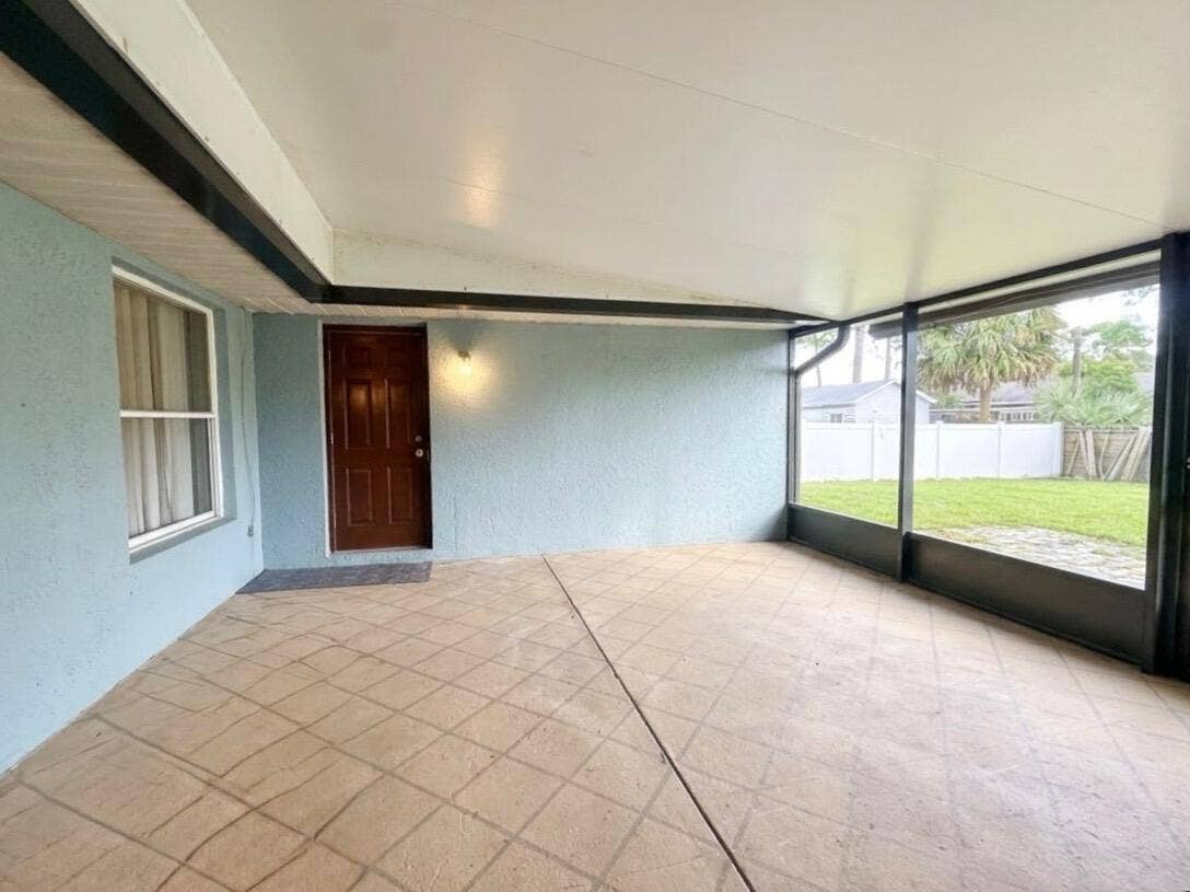 972 Canton Street NW, Palm Bay, FL 32907 actual screened patio