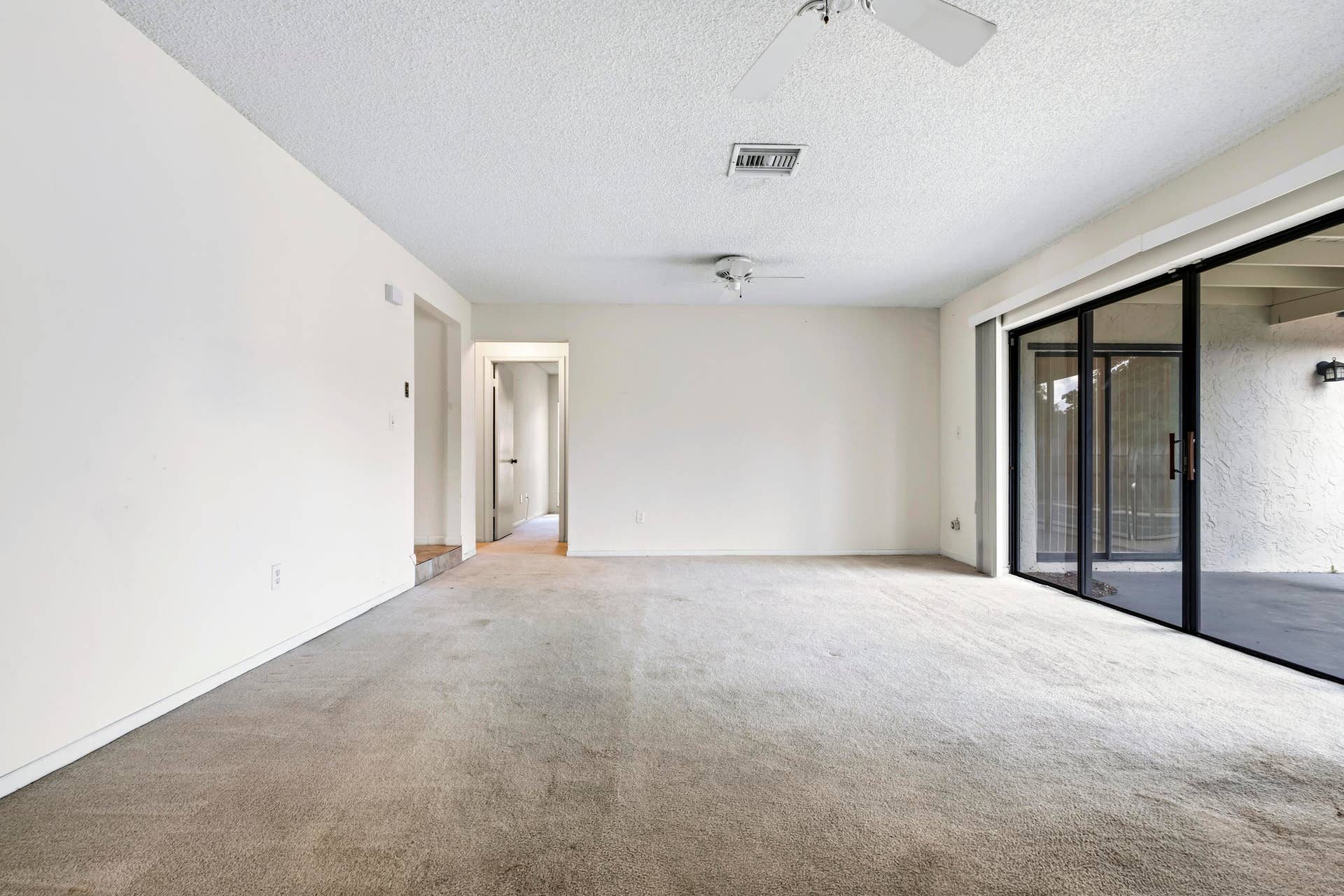 4937 Willow Drive, Boca Raton, FL 33487 Family Room Overlooking Pool/ Patio
