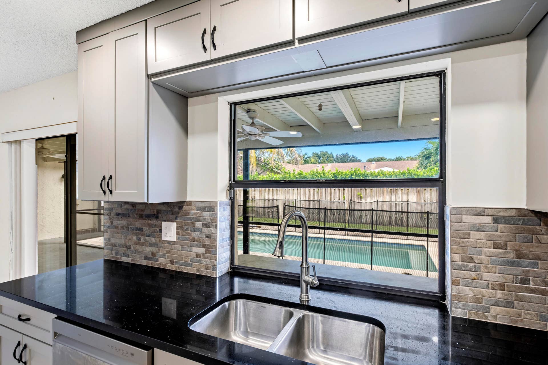 4937 Willow Drive, Boca Raton, FL 33487 Kitchen Overlooking Pool/Patio