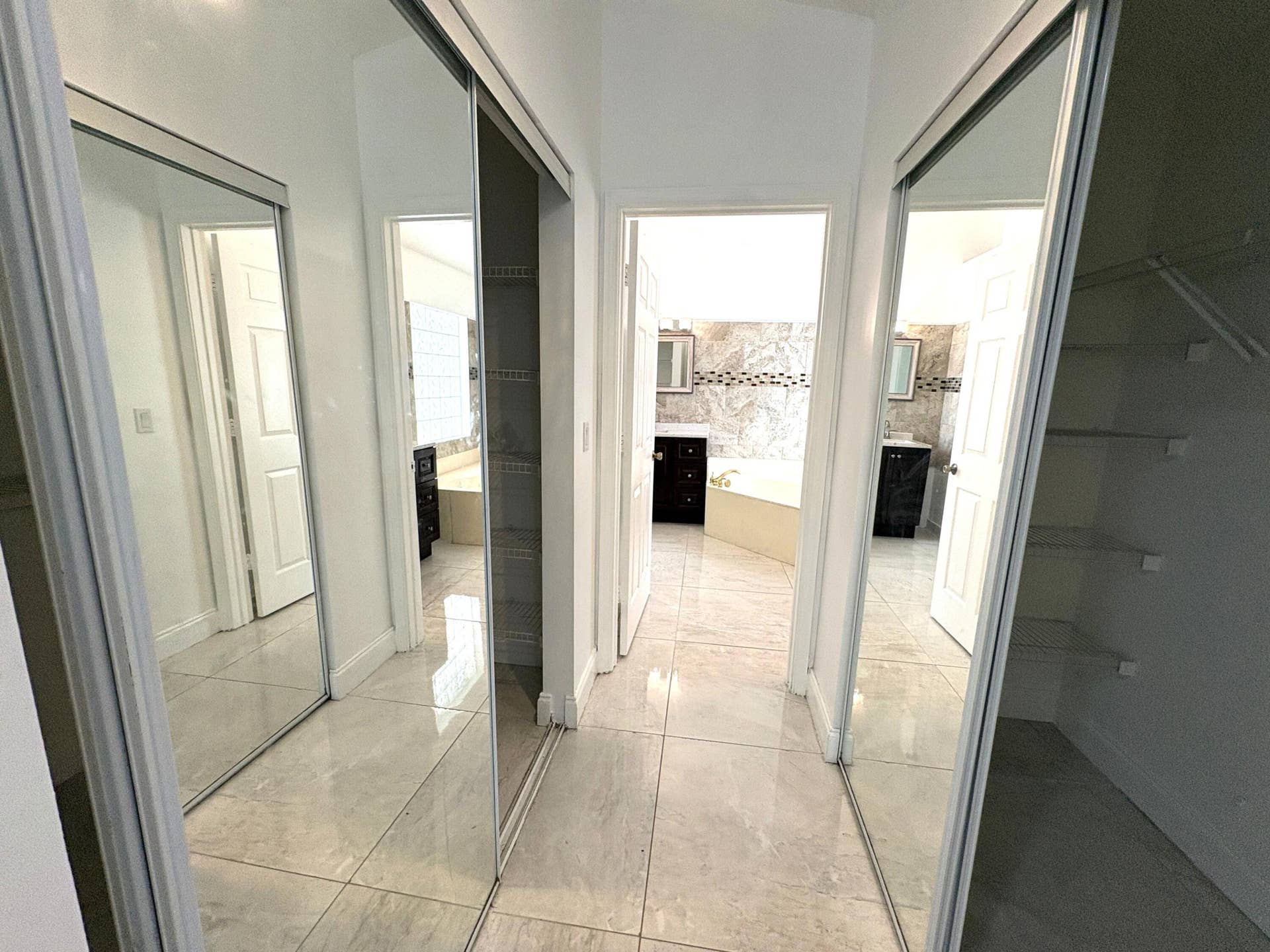 1842 OAK BERRY Circle, Wellington, FL 33414 Master walk in cloth sets (2)
