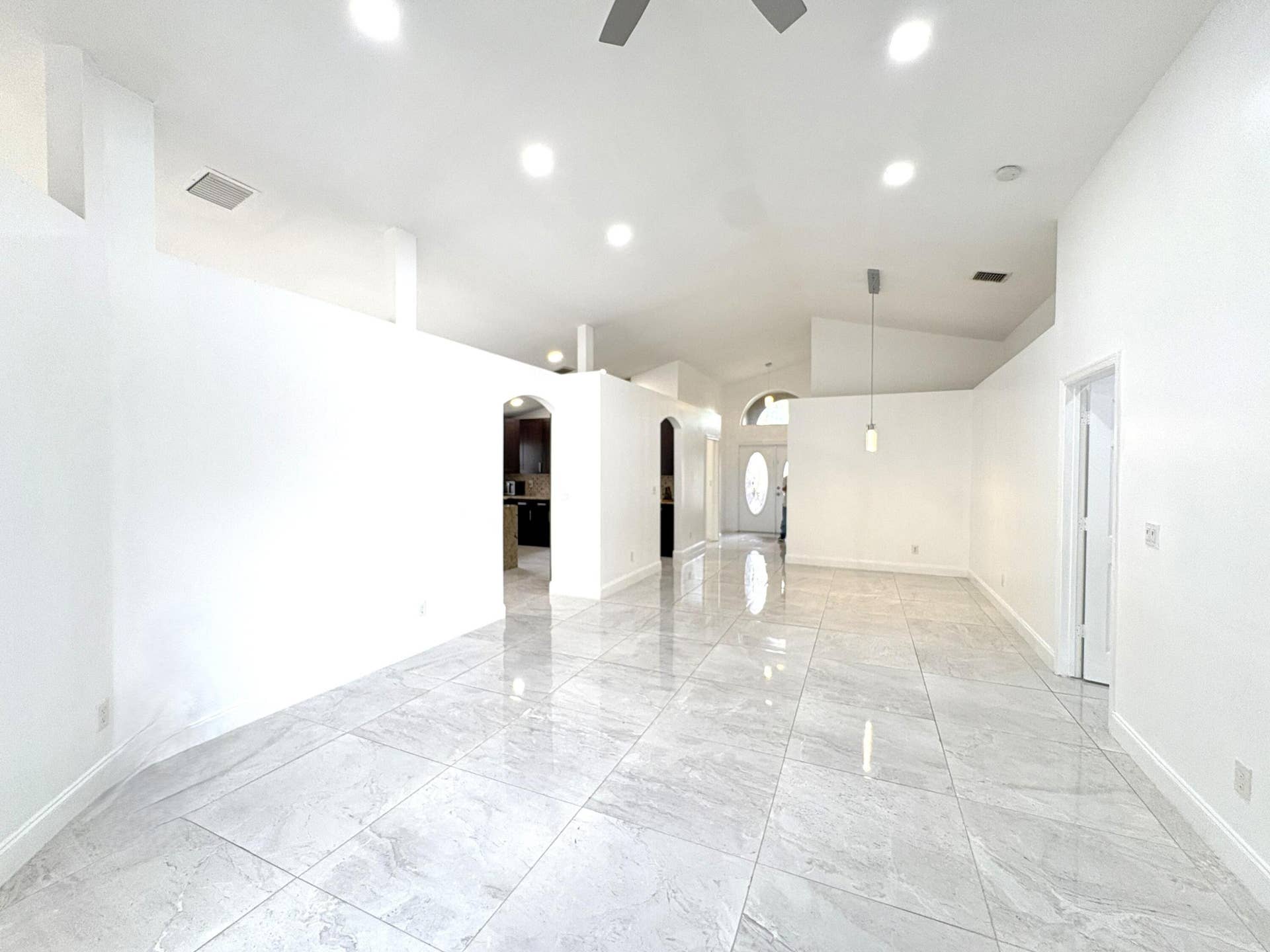1842 OAK BERRY Circle, Wellington, FL 33414 LV room separates Family room by the wall