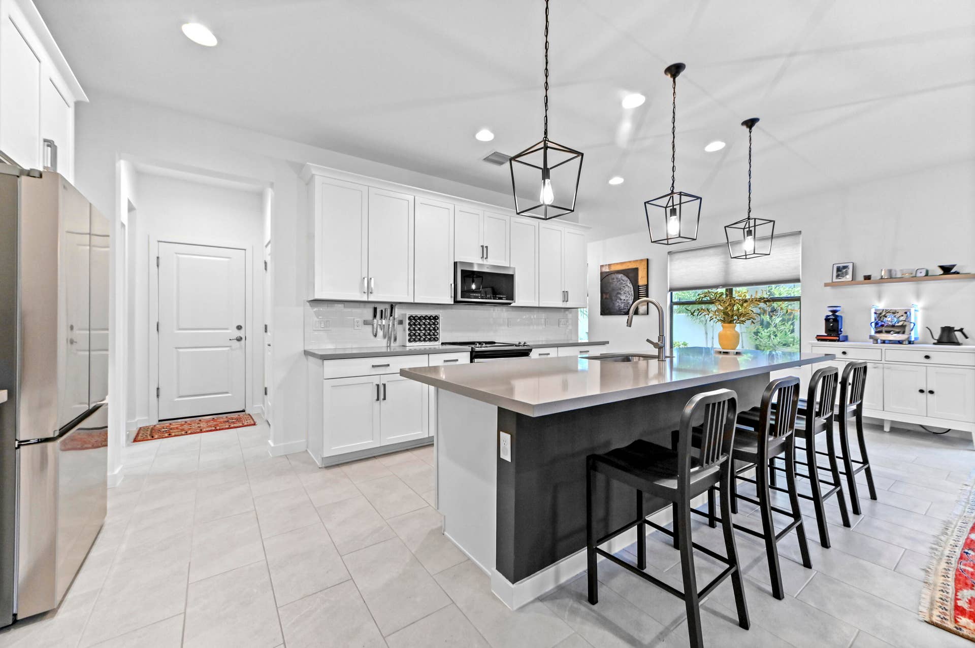 8728 Corvus Drive, Lake Worth, FL 33467 Spacious snack counter with designer lighting and adjacent large pantry