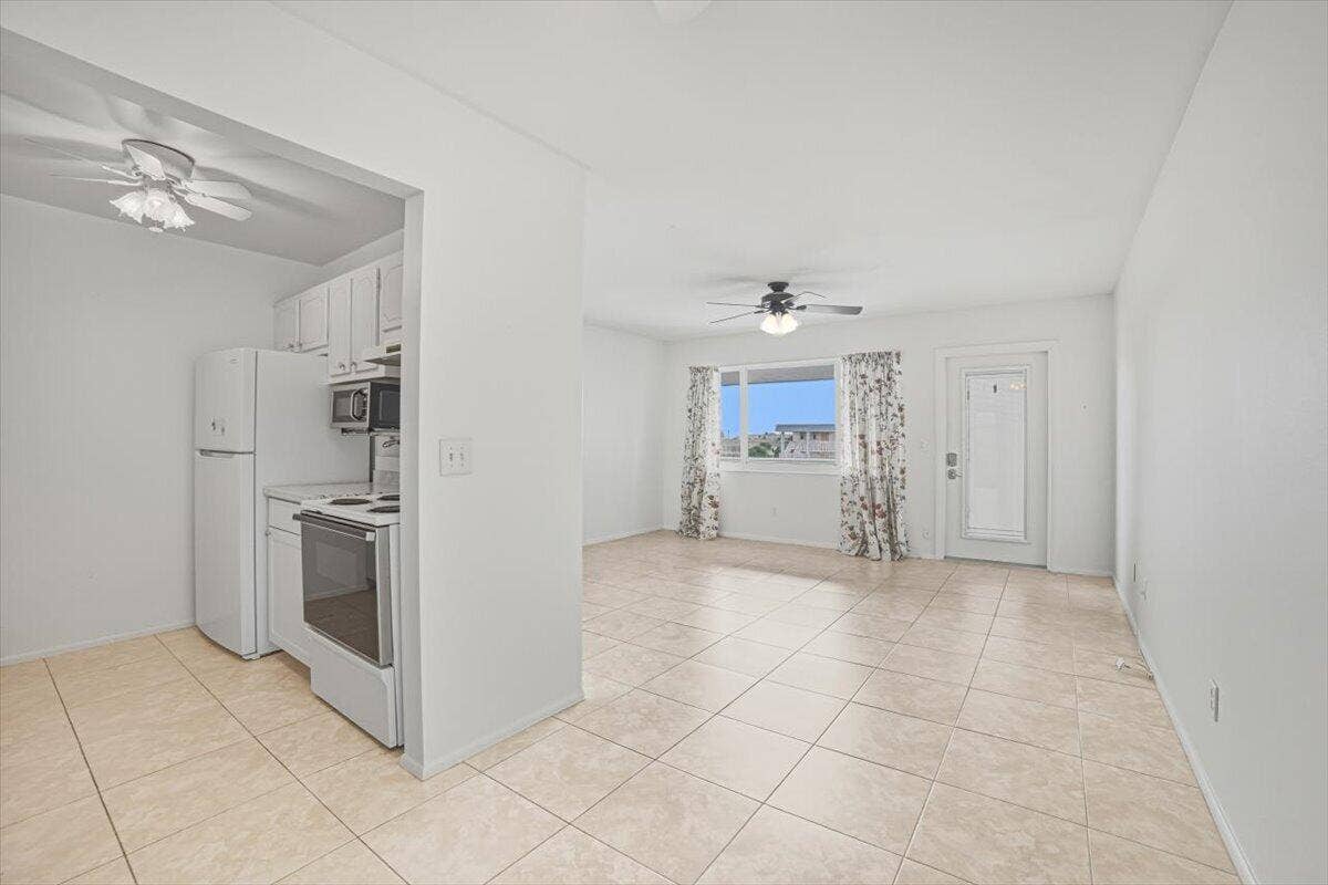 131 Doolen Court, #306, North Palm Beach, FL 33408 Living & Dining & Galley Kitchen