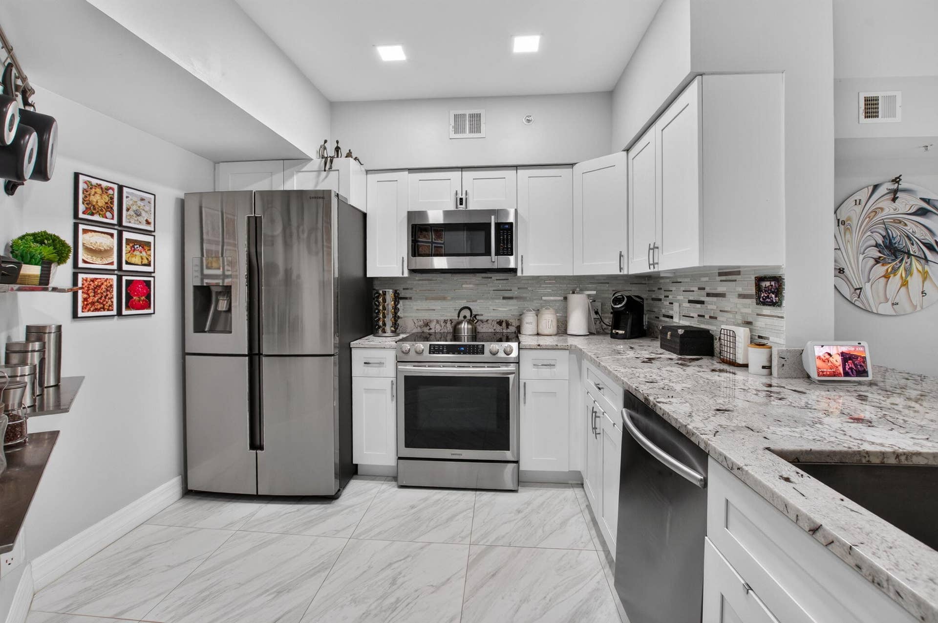 2109 TUSCANY Way, #109, Boynton Beach, FL 33435 Stylish Kitchen with White Cabinetry