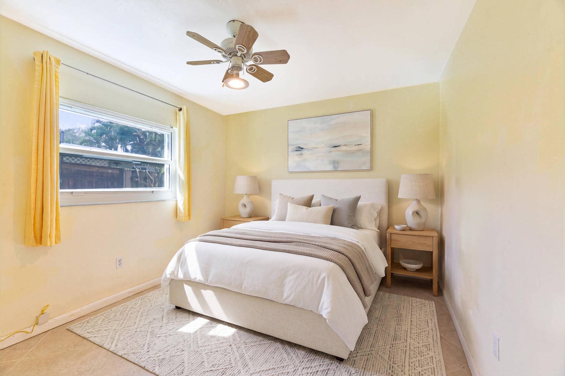 Virtually Staged, tiled flooring, horizontal sliding window, and a central ceiling fan with integrated lighting