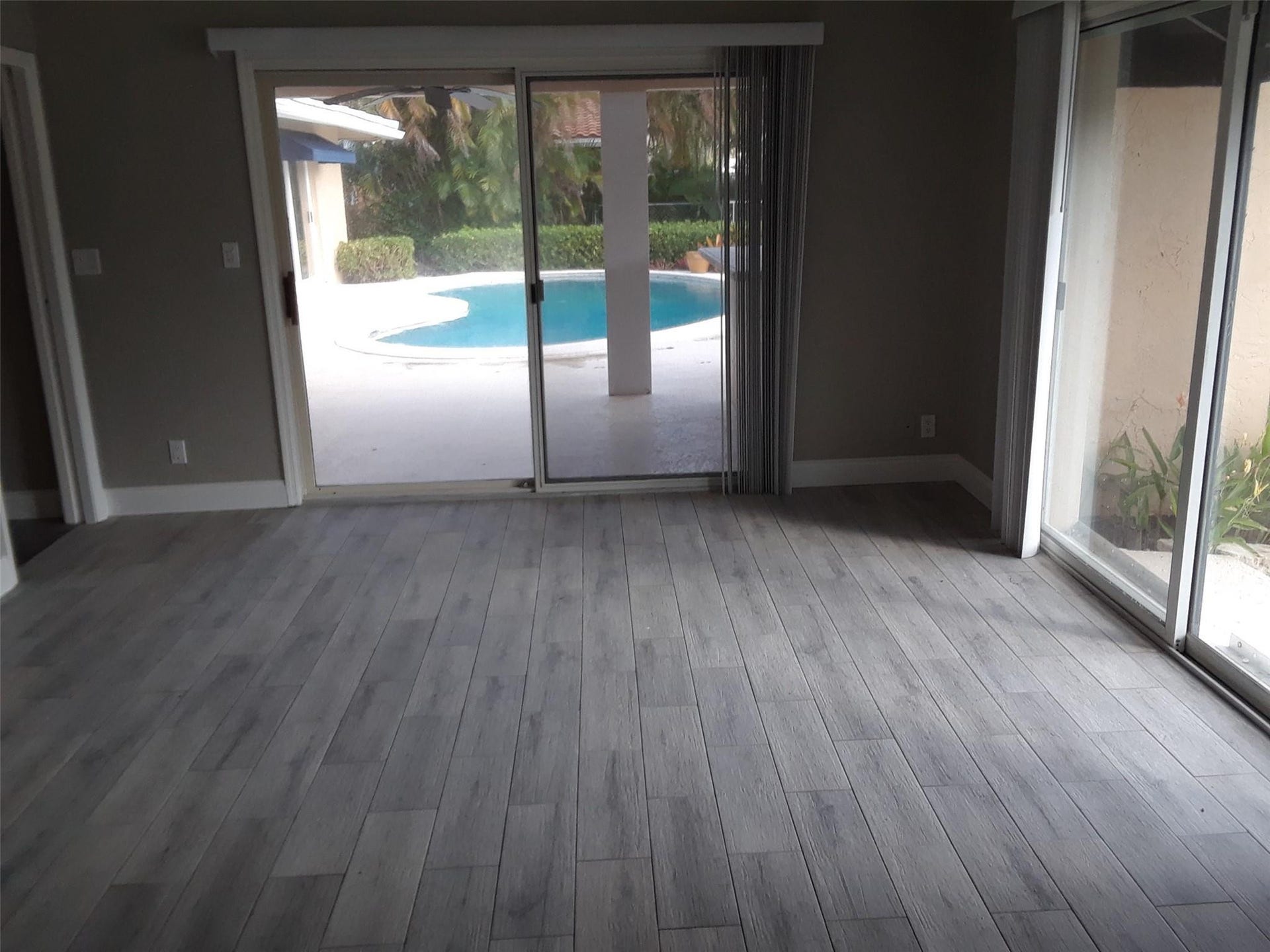 2330 NE 33RD Street, Lighthouse Point, Lighthouse Point, FL 33064 2nd bedroom has patio and yard sliding doors