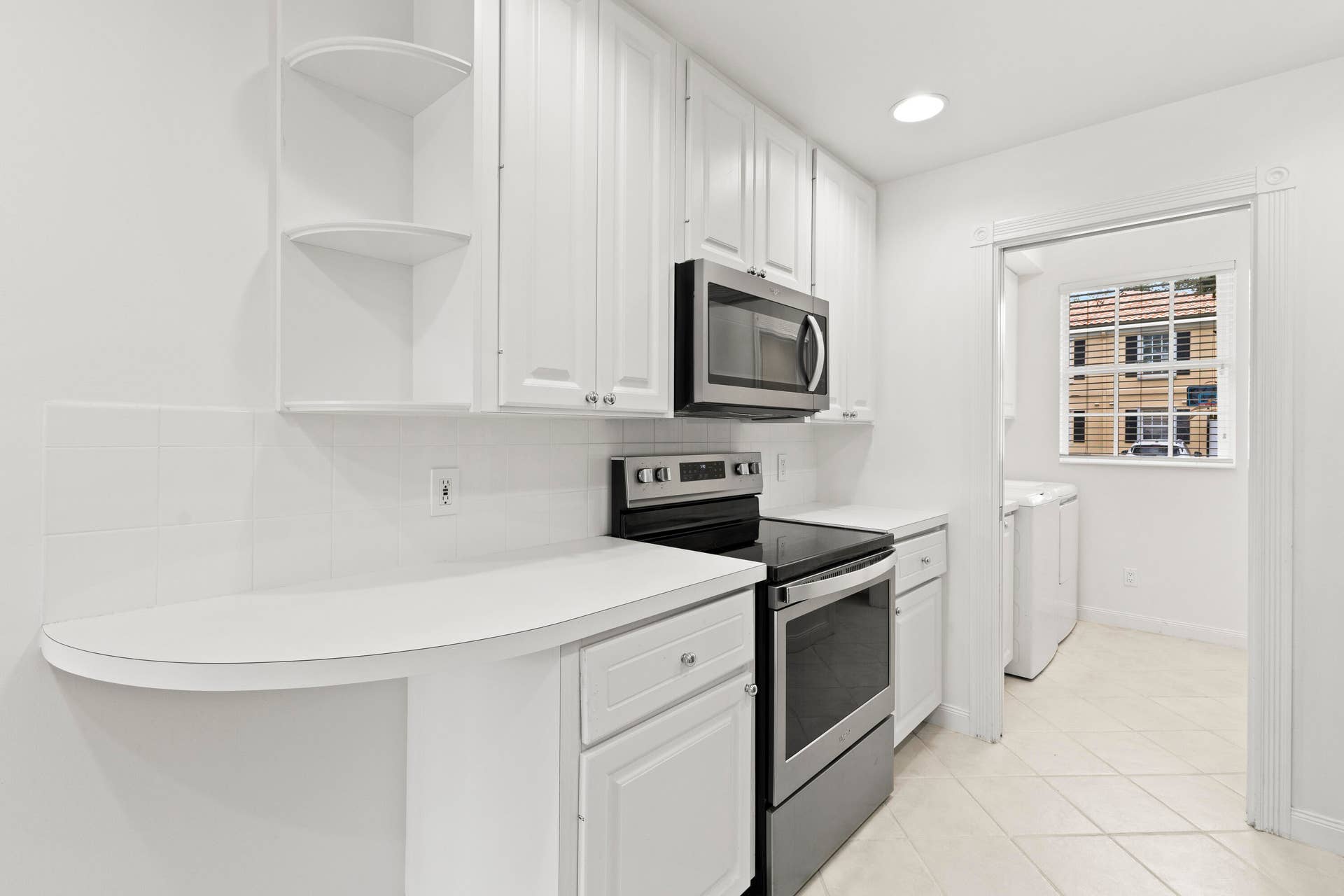 2006 W Tigris Drive, West Palm Beach, West Palm Beach, FL 33411 Kitchen to laundry Room