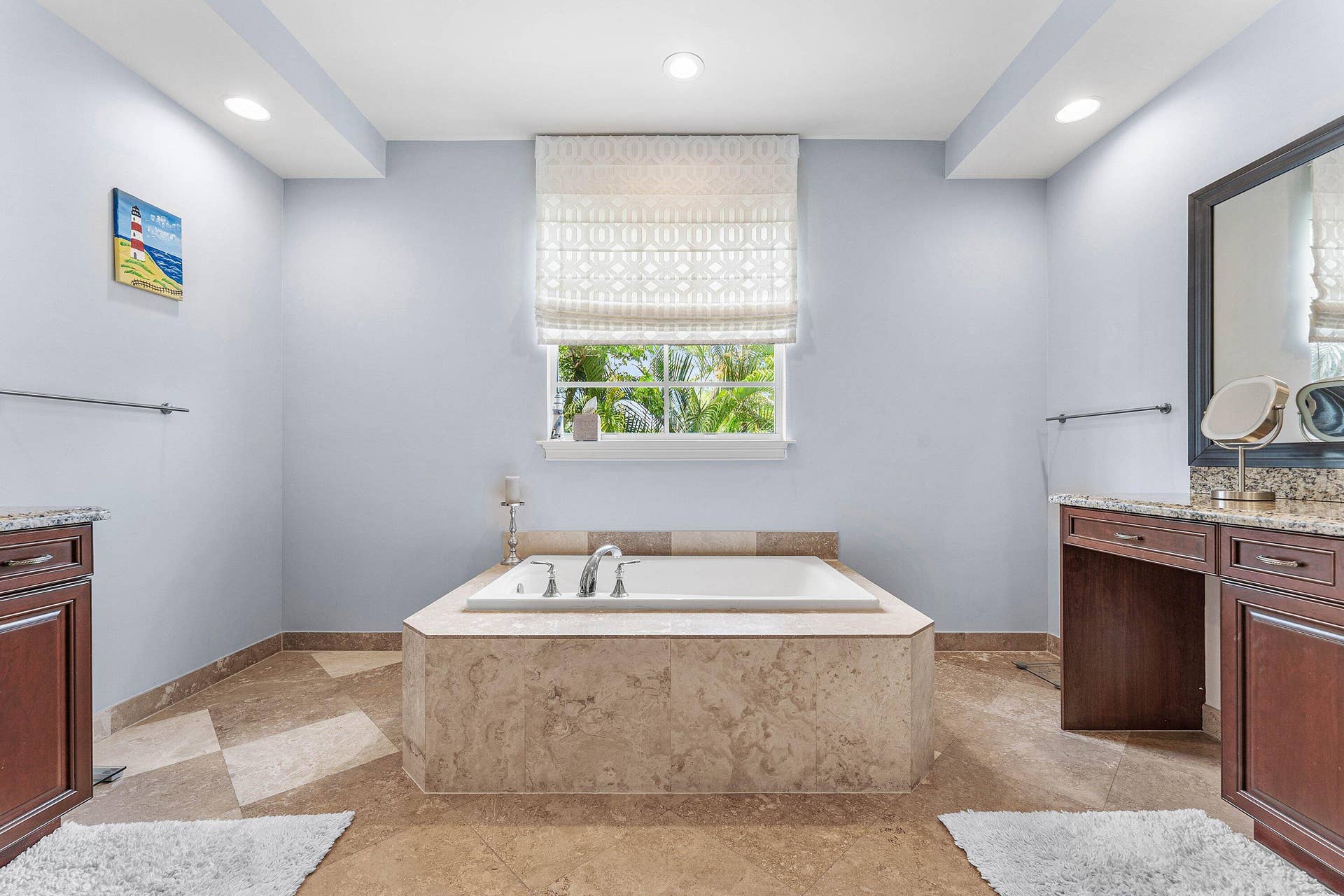 115 VIA POINCIANA Lane, Boca Raton, FL 33487 Spacious master bathroom featuring a large garden tub, dual sinks, granite countertops, and abundant natural light.