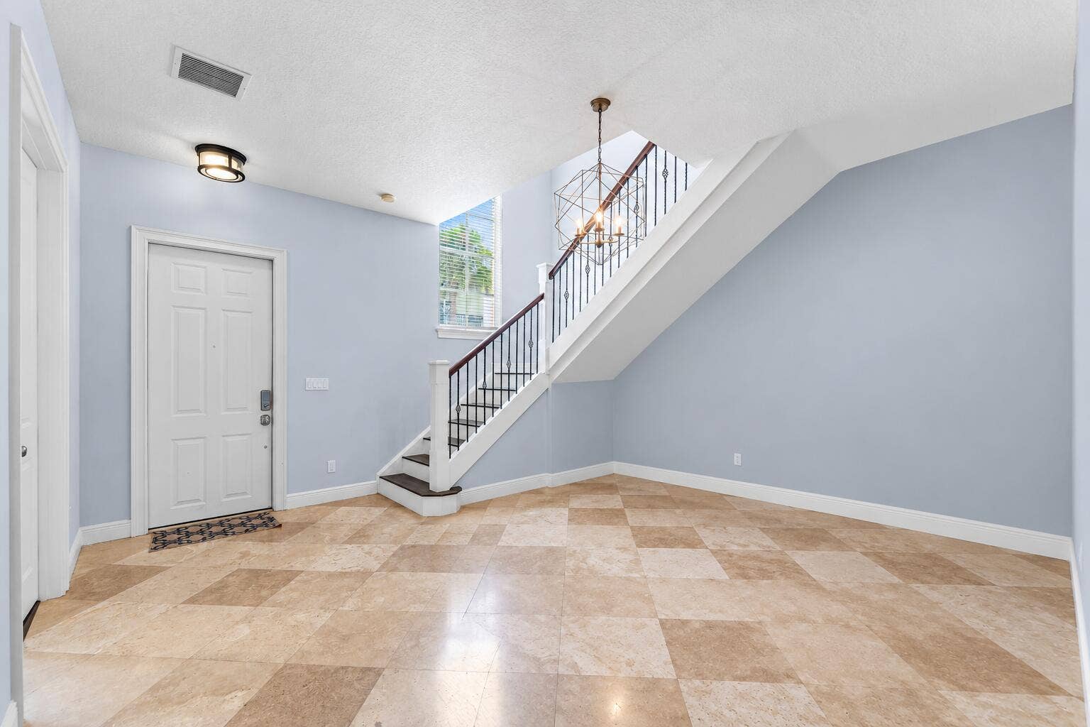 115 VIA POINCIANA Lane, Boca Raton, FL 33487 Airy Modern Foyer with Geometric Chandelier