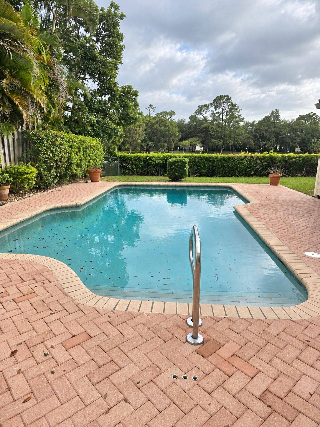6458 Sweet Maple Lane, Boca Raton, Boca Raton, FL 33433 Inviting Outdoor Pool with Expansive Brick Paver Patio & Lush Tropical Landscaping