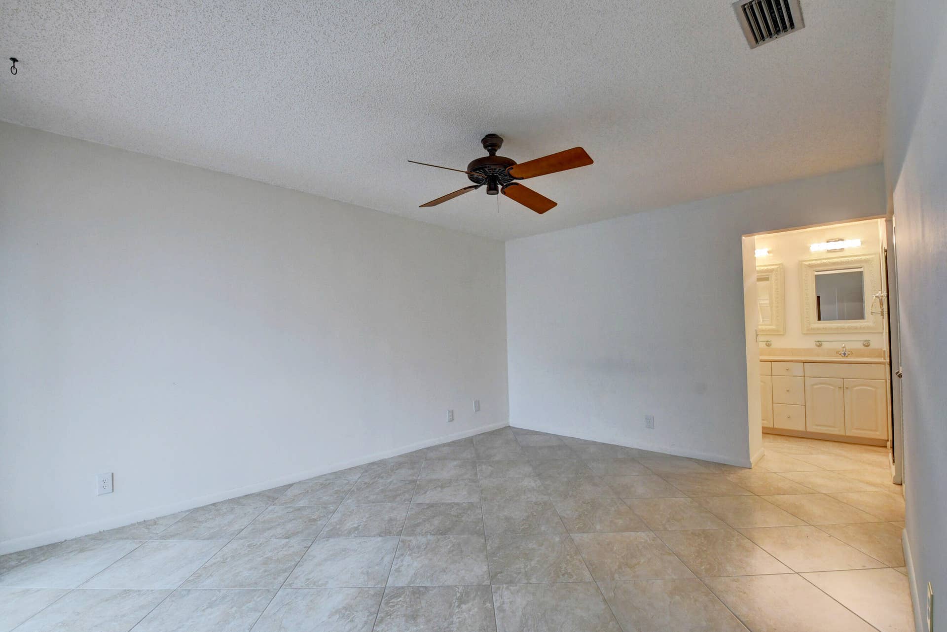 6458 Sweet Maple Lane, Boca Raton, Boca Raton, FL 33433 Airy Master Bedroom with Neutral Finishes, Ceiling Fan & Private Bathroom Access