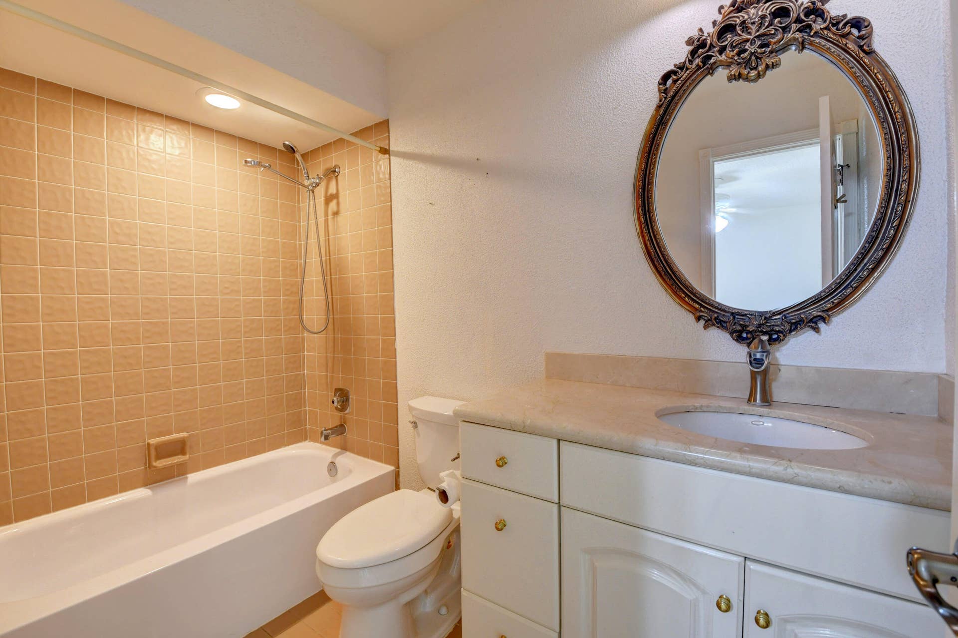 6458 Sweet Maple Lane, Boca Raton, Boca Raton, FL 33433 Spacious Guest Bathroom with Tiled Bathtub, Classic Vanity & Decorative Mirror