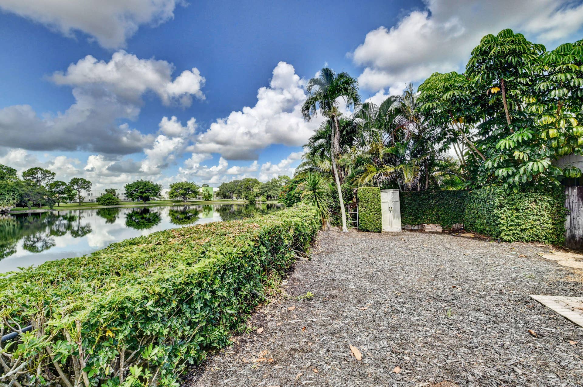 6458 Sweet Maple Lane, Boca Raton, Boca Raton, FL 33433 Private Outdoor Area with Mature Tropical Landscaping, Lush Greenery & Paved Walkway